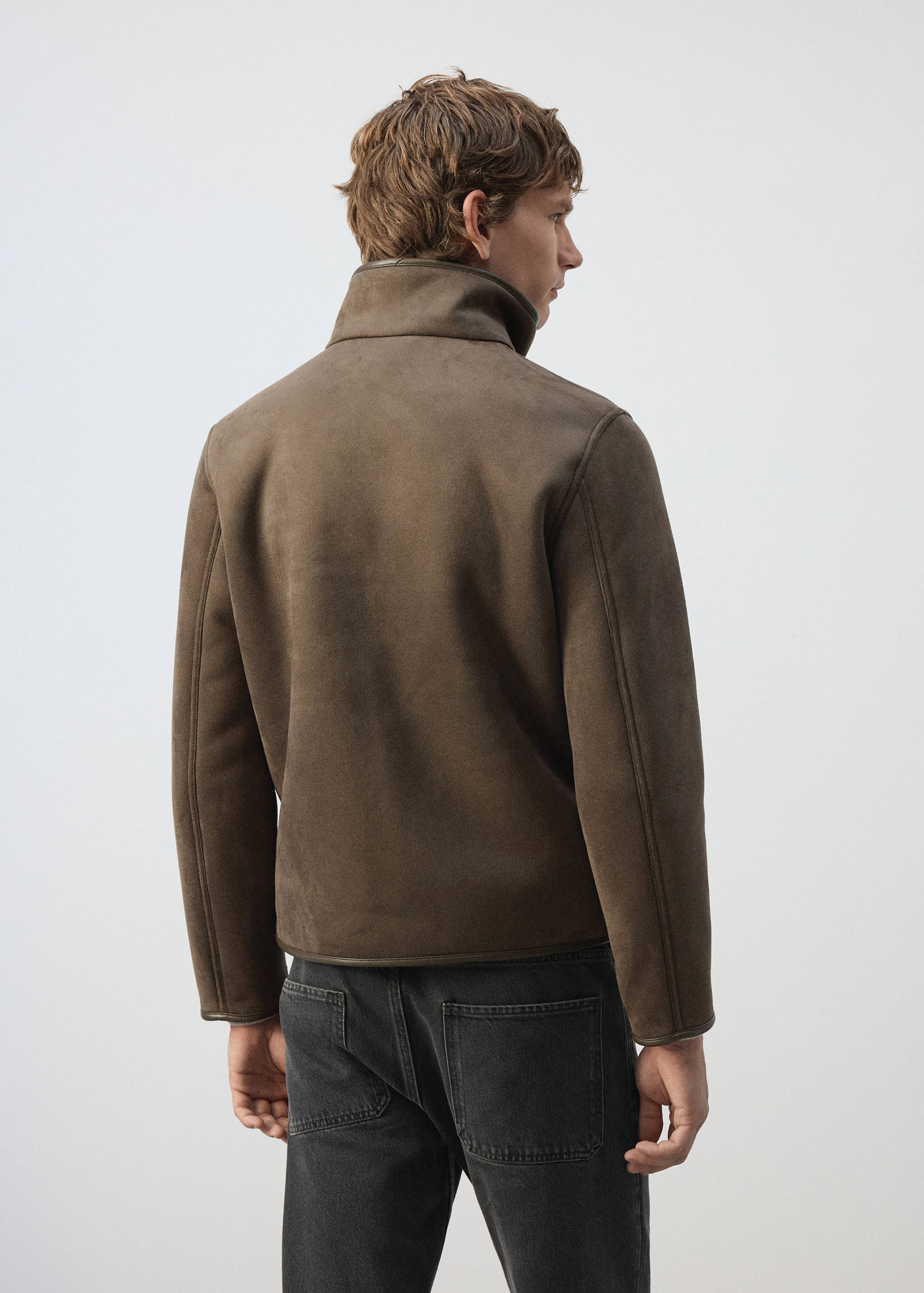 Dark olive green jacket with a high collar, shown from the back.