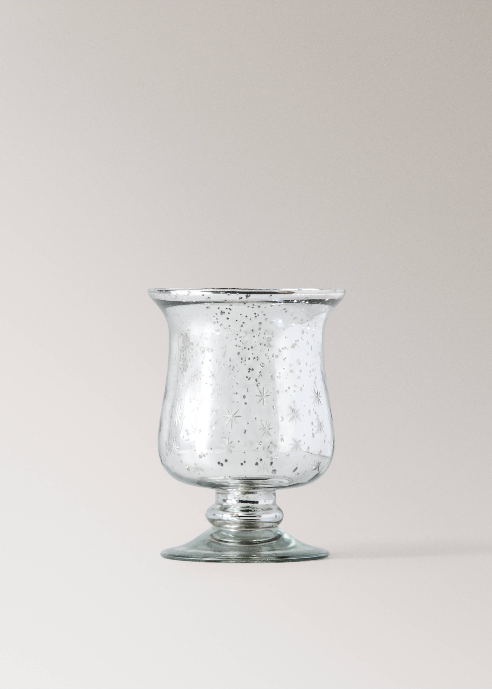 Silver speckled glass candle holder with star motifs and a pedestal base., Silver. Ref: 37007899-00.