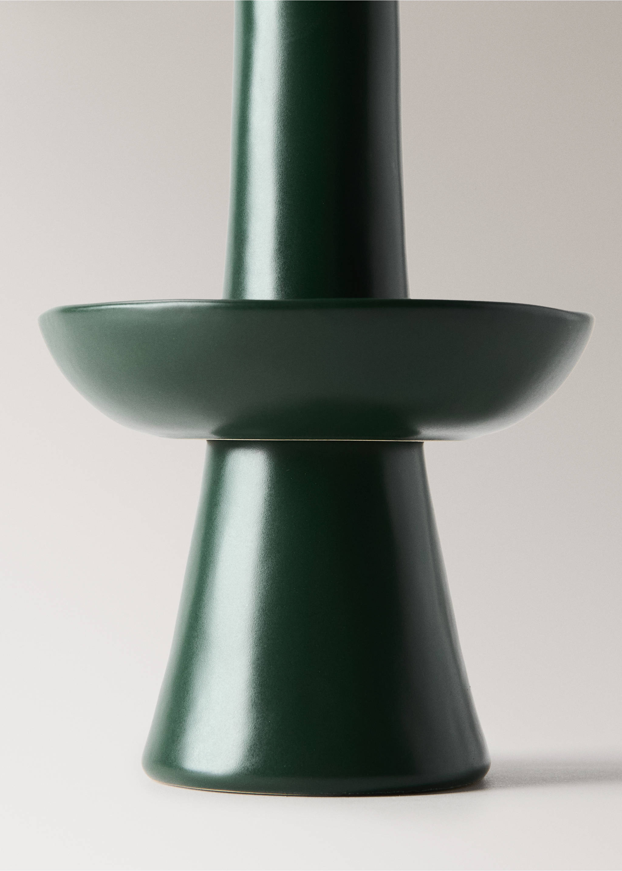 Dark green ceramic candle holder with a tapered base and wide circular tray., Green. Ref: 37007901-00.