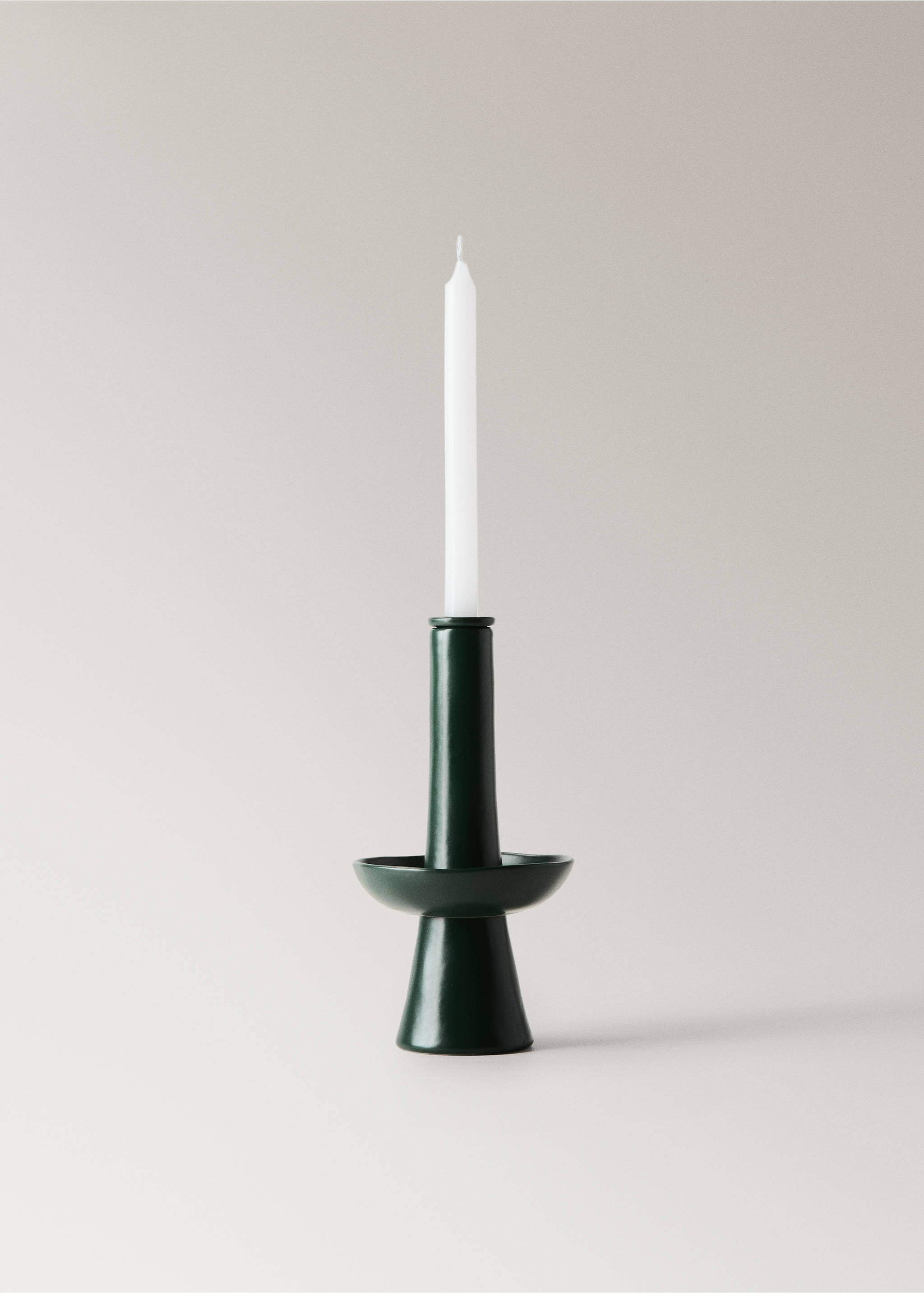 Dark green ceramic candle holder with a flared base and white taper candle., Green. Ref: 37007901-00.
