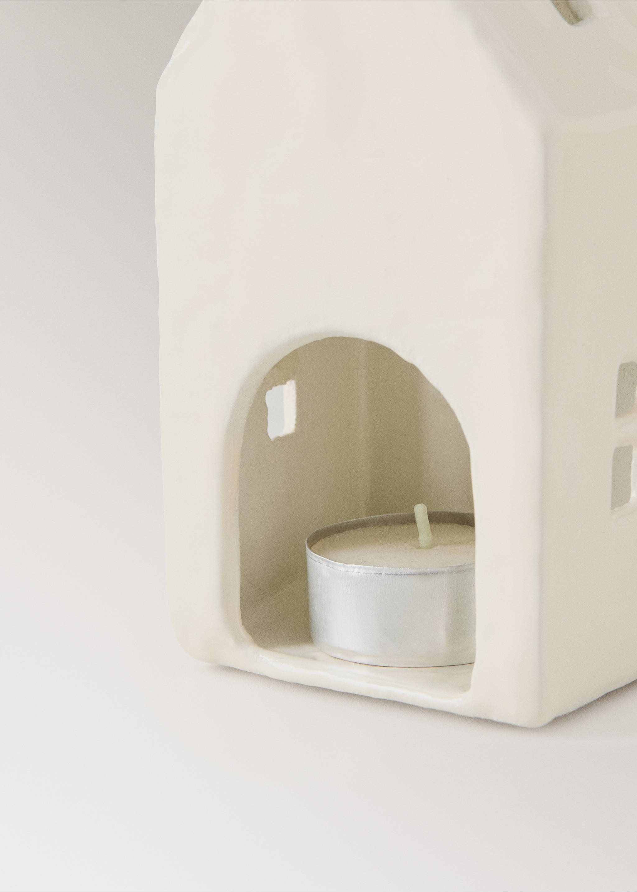 Off-white ceramic house-shaped candle holder with an arched doorway., Off White. Ref: 37007906-00.