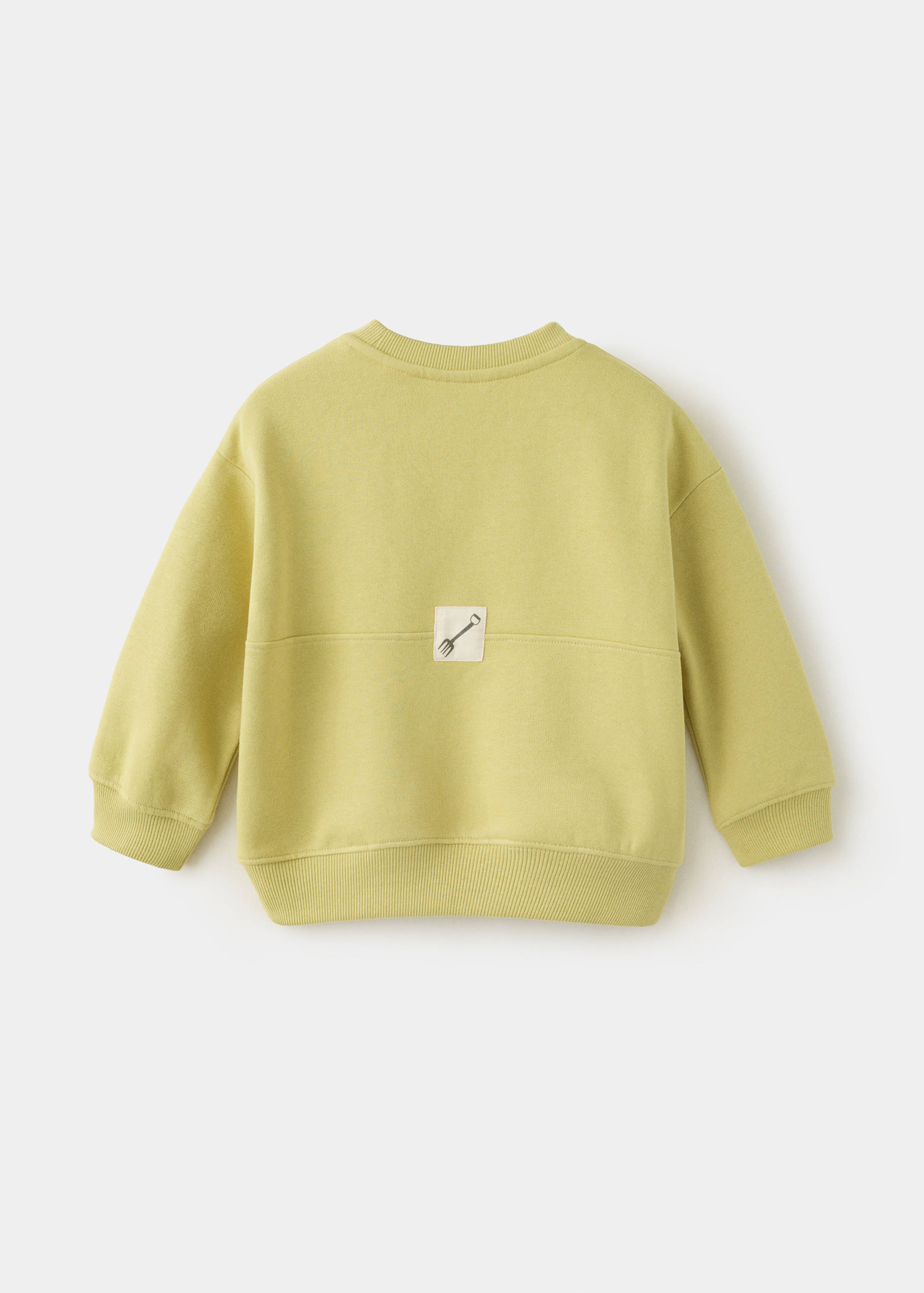 Light green kids' sweatshirt from the back, featuring a ribbed neckline and a small patch.