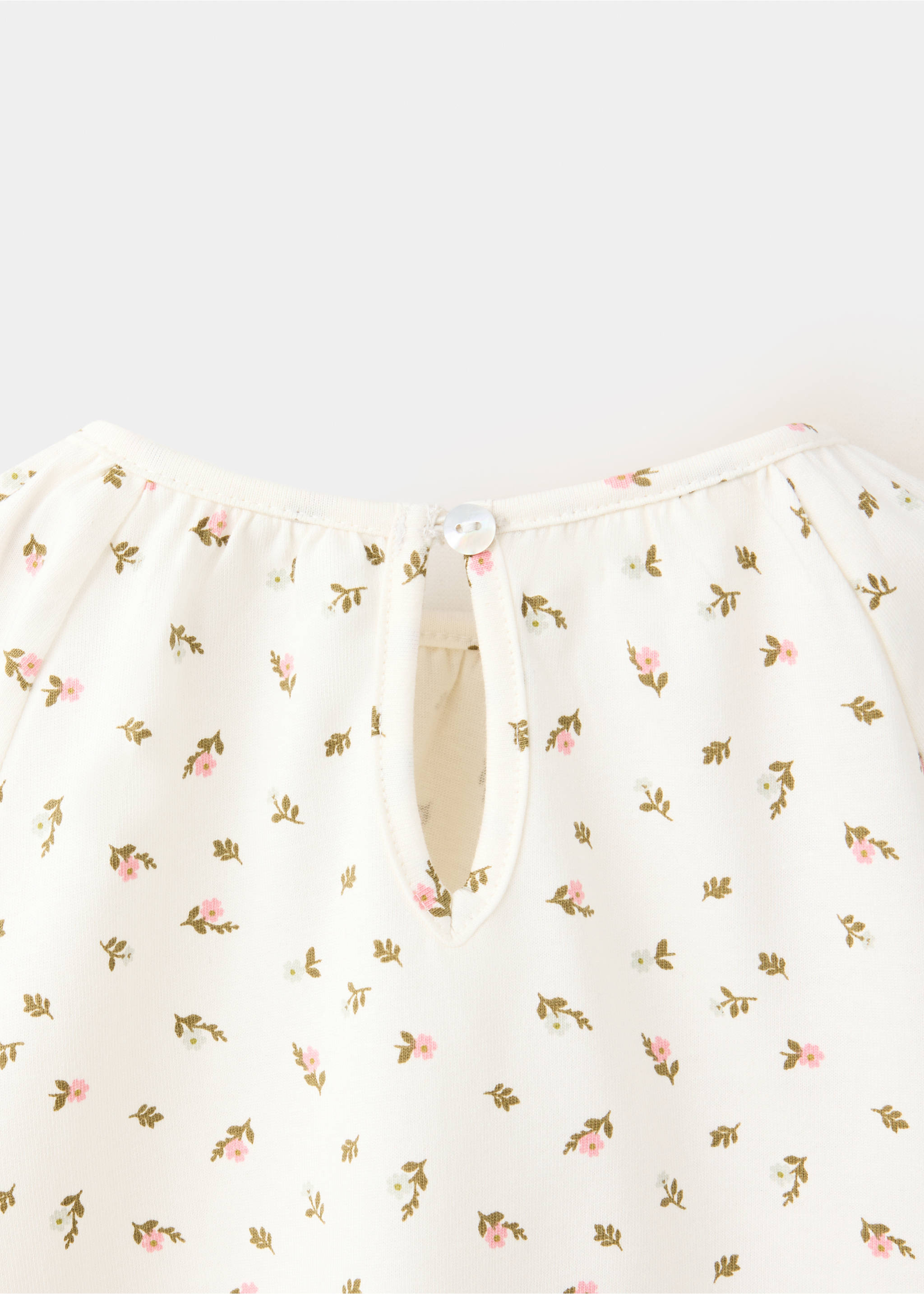 Back keyhole detail of a cream floral print t-shirt., Sand. Ref: 37007925-00.