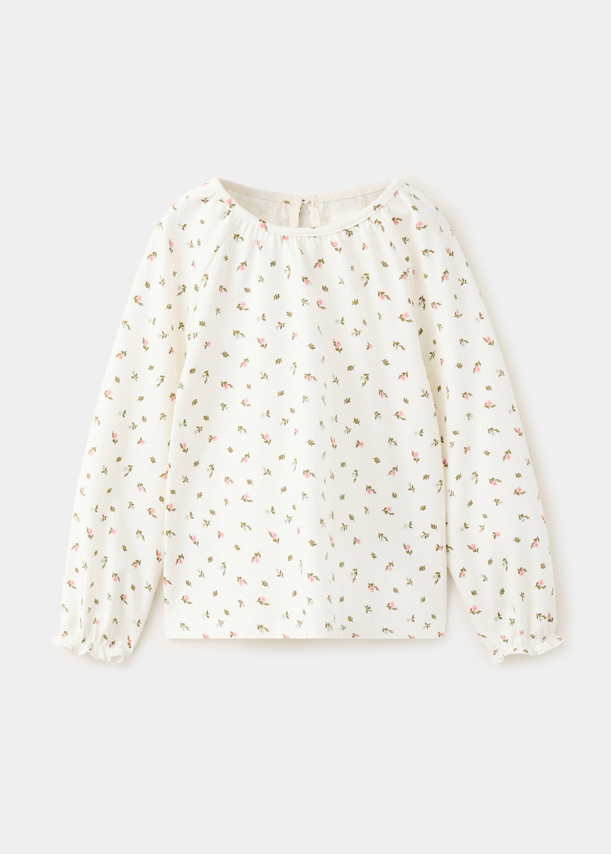 Off-white floral t-shirt with long sleeves, ruffled cuffs, and a gathered round neckline.