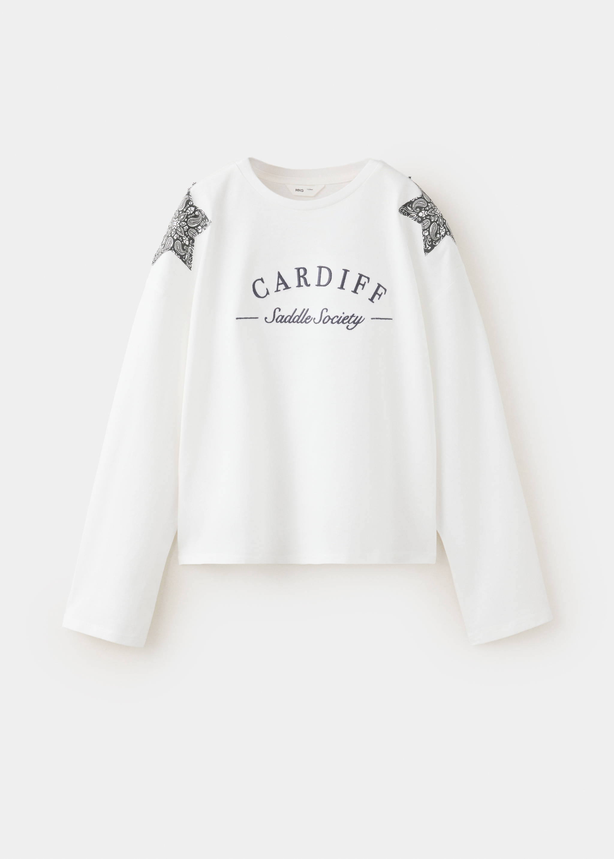 White long-sleeve t-shirt with black text and paisley star patches.