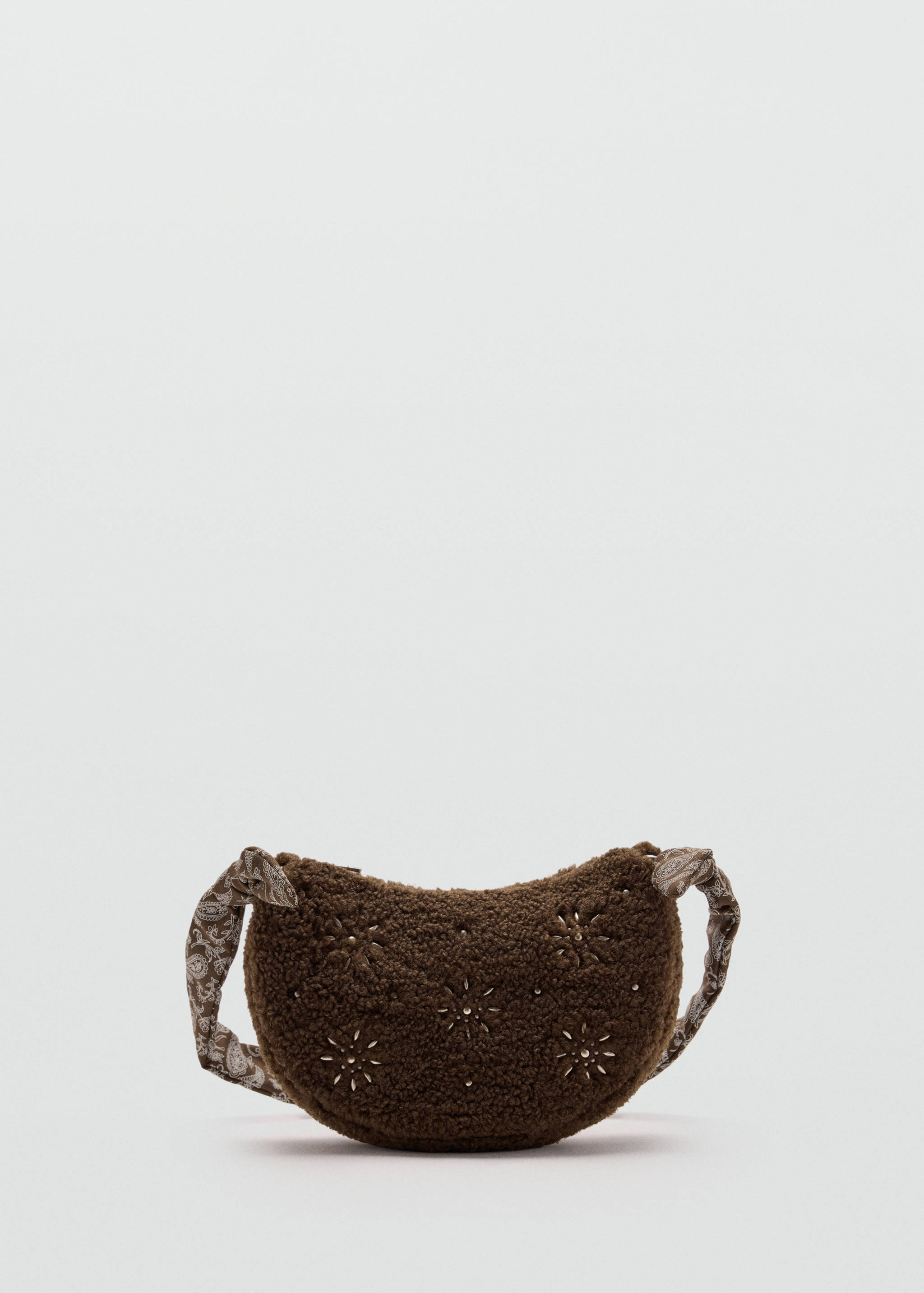 Brown faux-fur mini bag with beaded star motifs and a patterned strap.