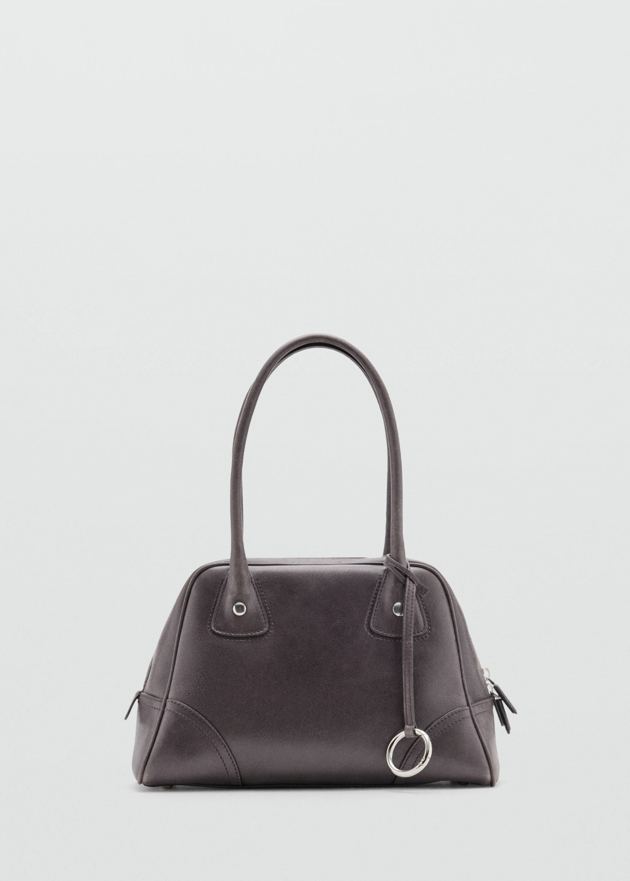 Dark grey bowling bag with top handles and silver-tone ring detail.