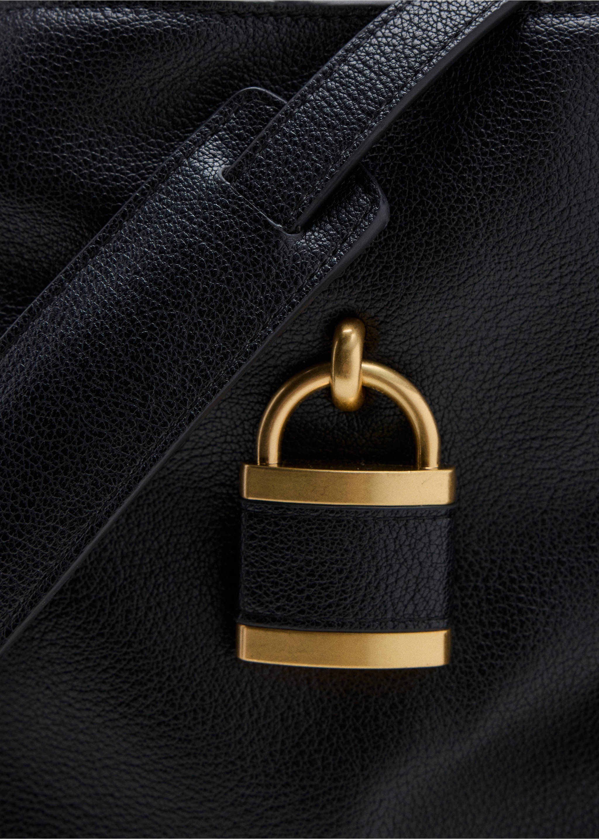 Black shoulder bag detail with a gold-toned padlock., Black. Ref: 37007945-00.