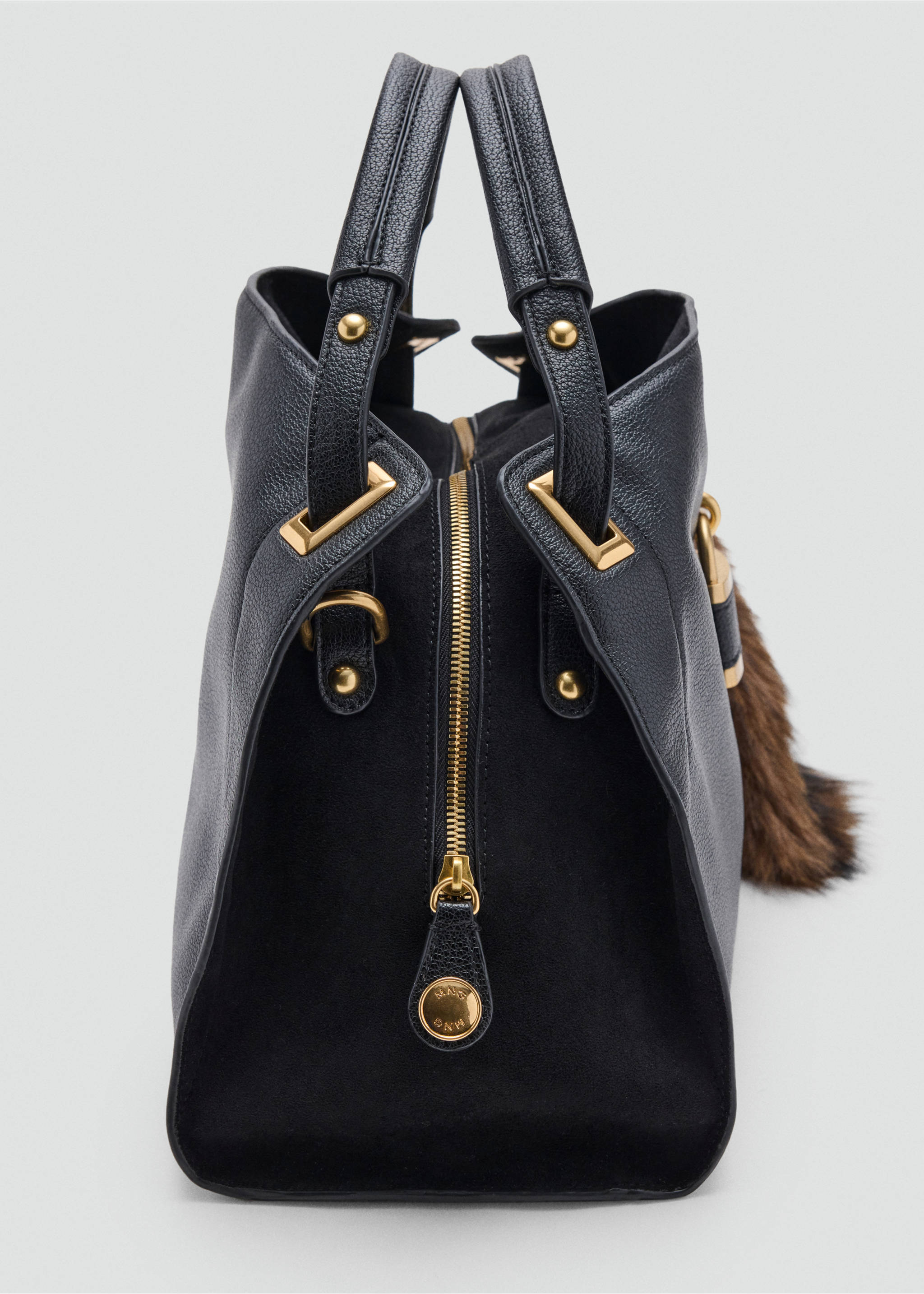 Close-up of a black textured leather and suede shoulder bag with gold hardware., Black. Ref: 37007945-00.