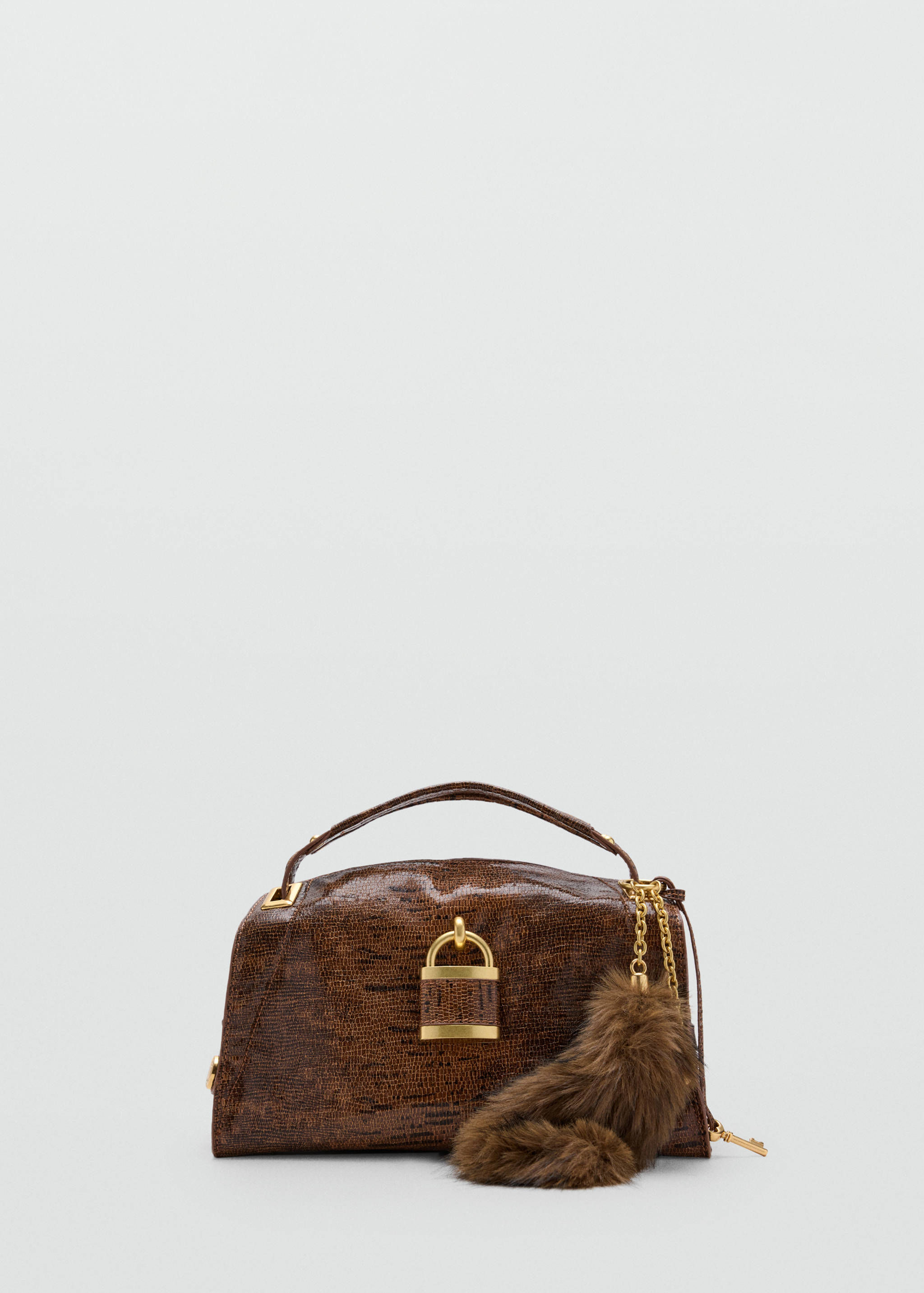 Brown textured cross-body bag with gold hardware and a faux-fur charm.