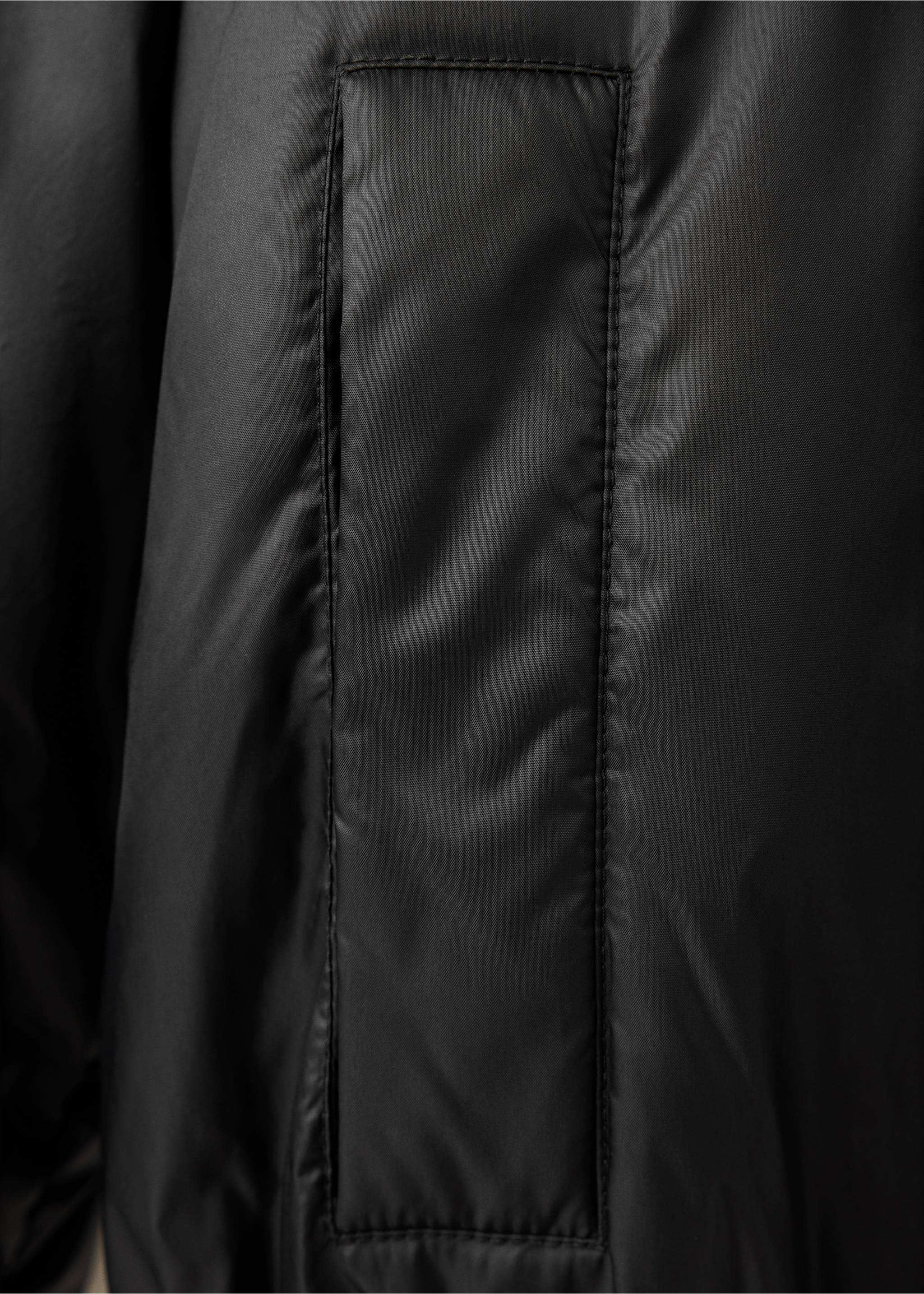 Close-up of the black anorak fabric and panel detail., Black. Ref: 37008274-00.