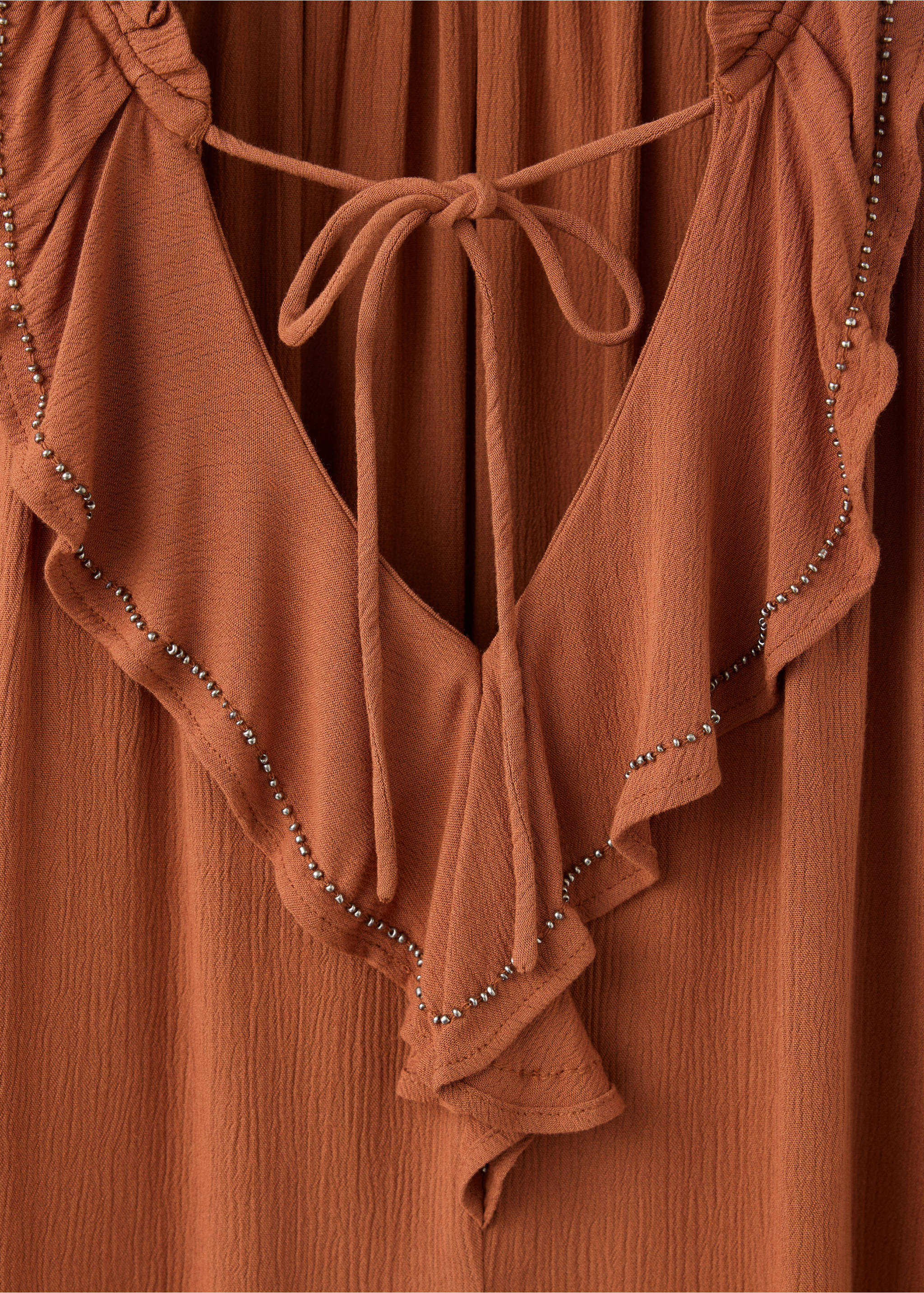 Blusa textura volantes - Detalle del artículo 8, Ocre. Ref: 37008279-00.