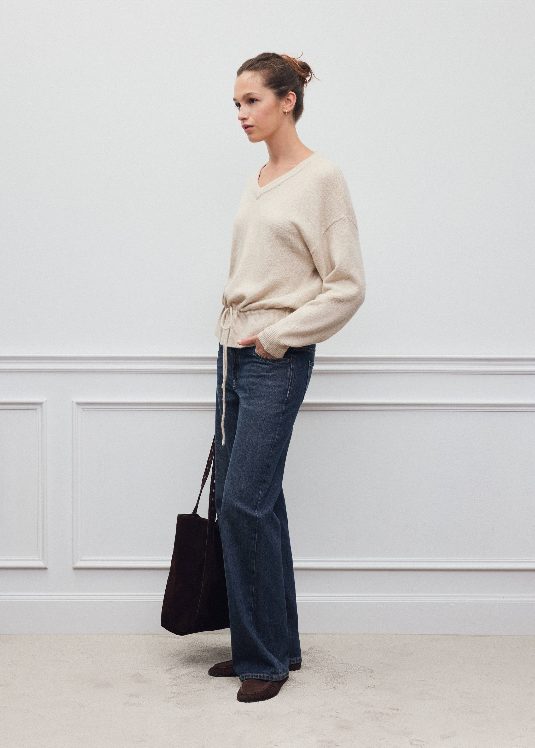 Cream V-neck jersey with a drawstring waist, worn with dark blue jeans., Beige. Ref: 37008290-00.