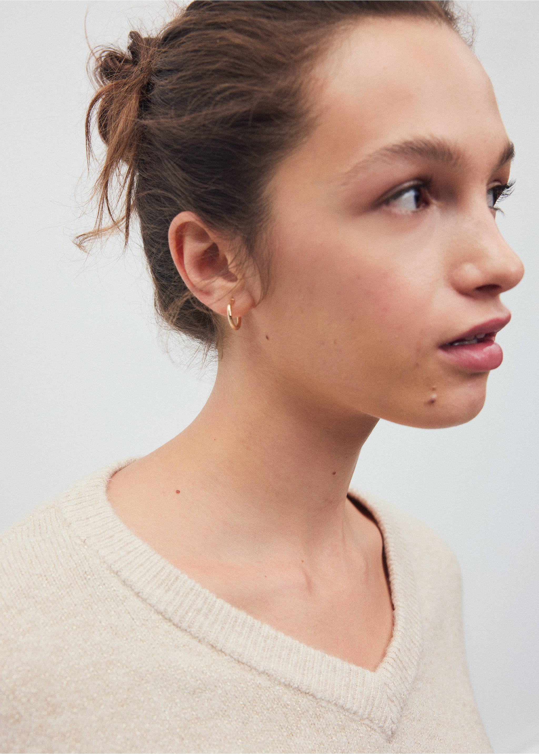 Close-up of a cream V-neck jersey detail., Beige. Ref: 37008290-00.