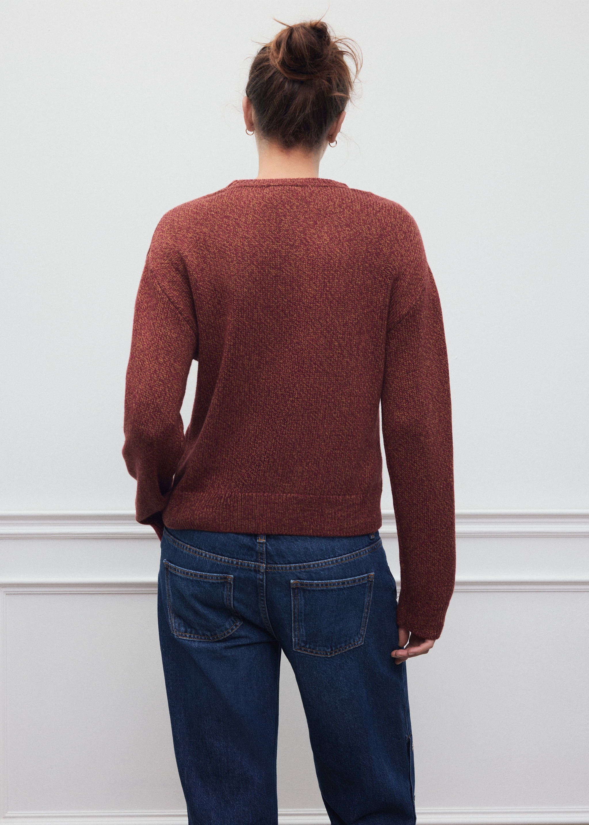 Reddish-brown knitted jersey, back view.