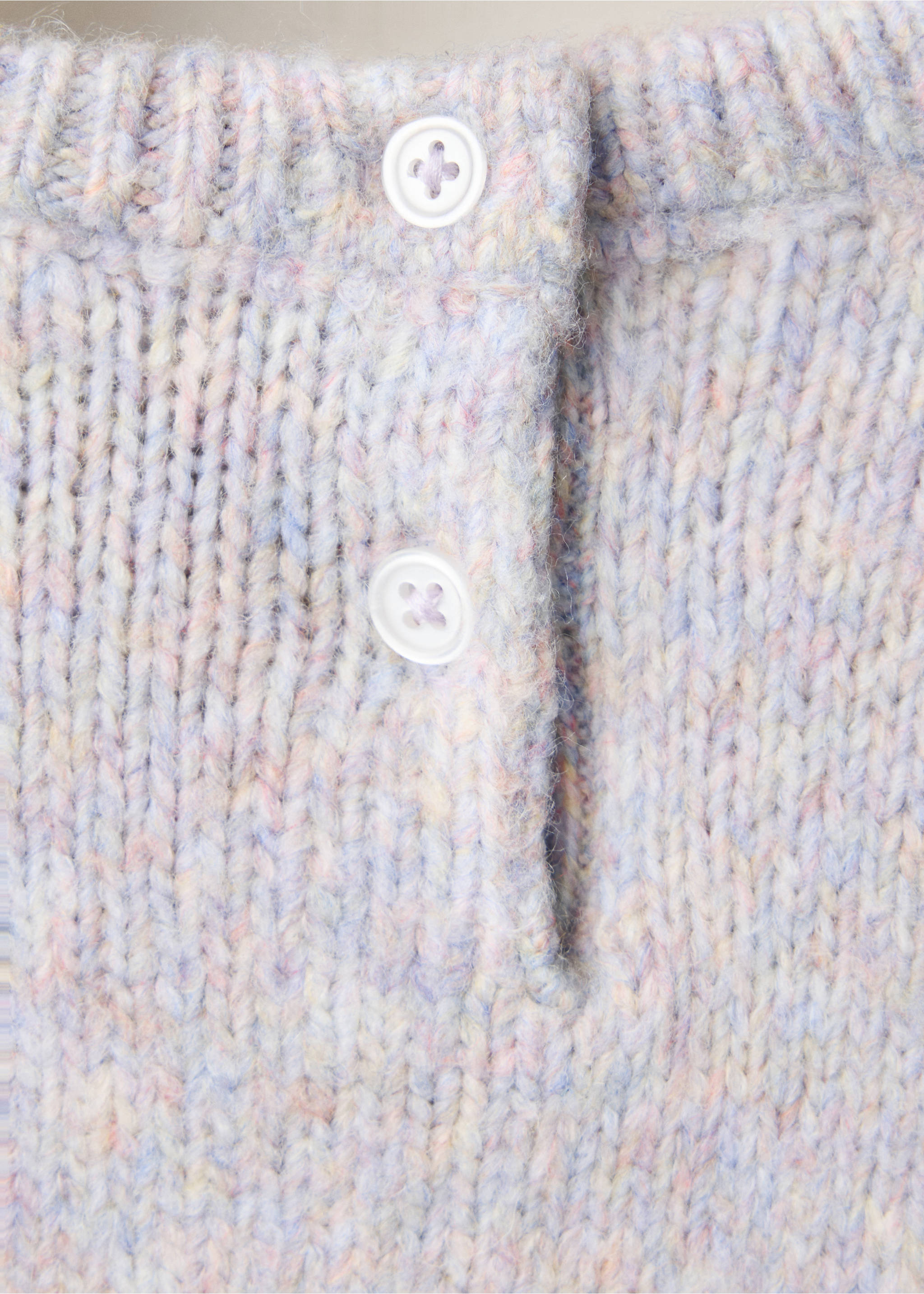 Close-up of a pastel knit jersey with a buttoned back neckline., Lilac. Ref: 37008292-00.