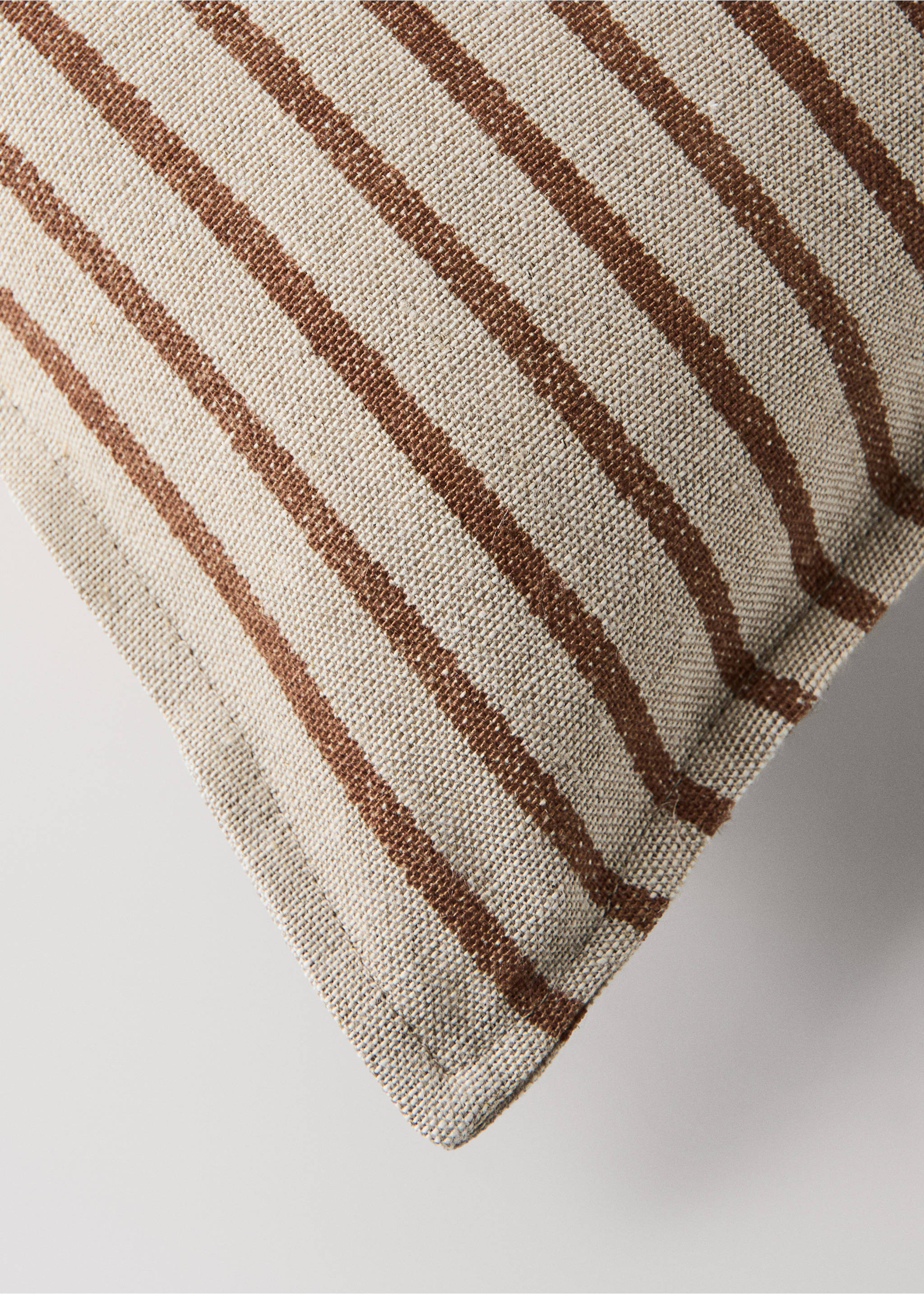 Close-up of a striped woven cushion cover in brown and off-white., Brown. Ref: 37008639-00.