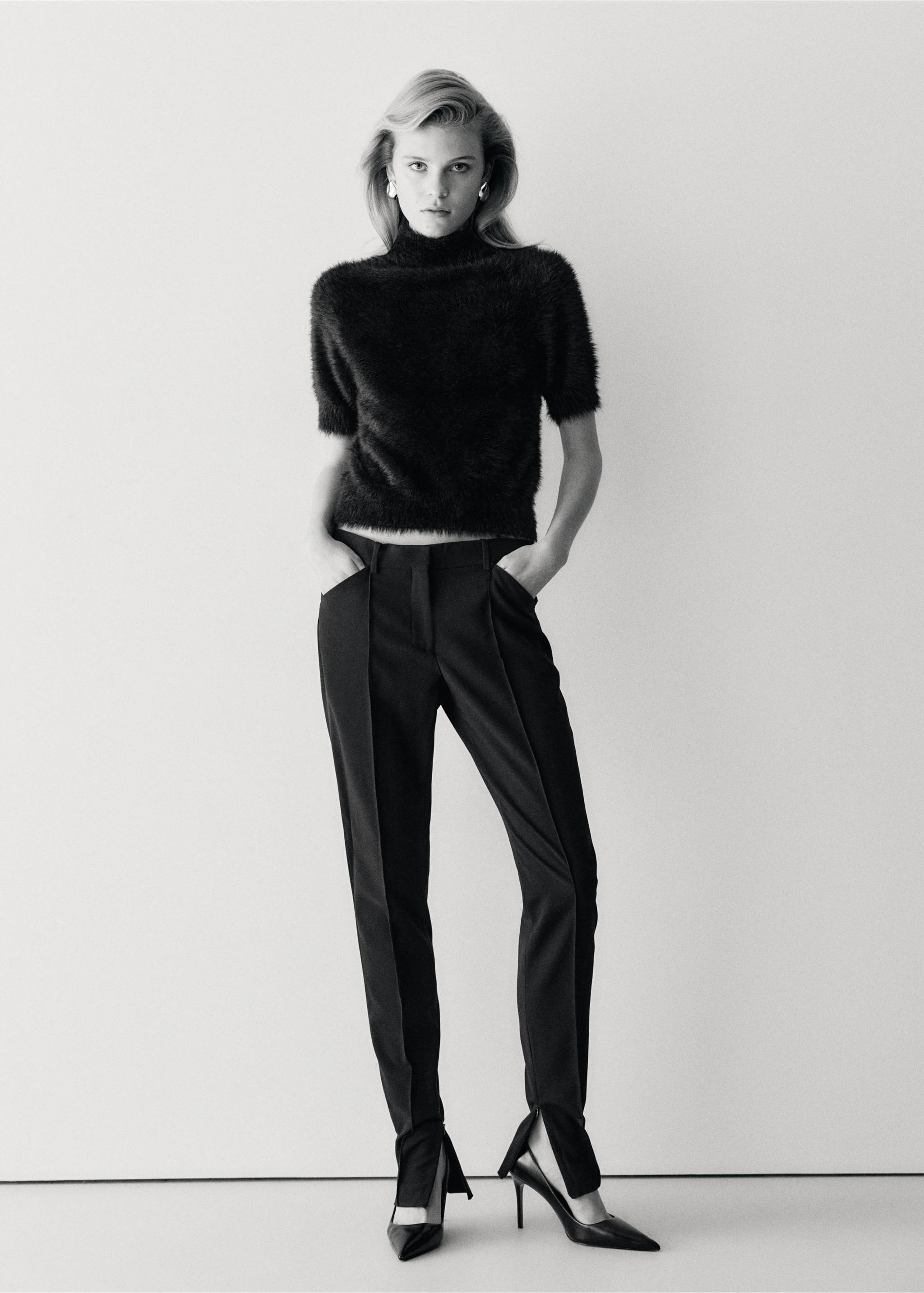 Black short-sleeved high-neck faux-fur jersey worn with trousers, Black. Ref: 37009131-00.