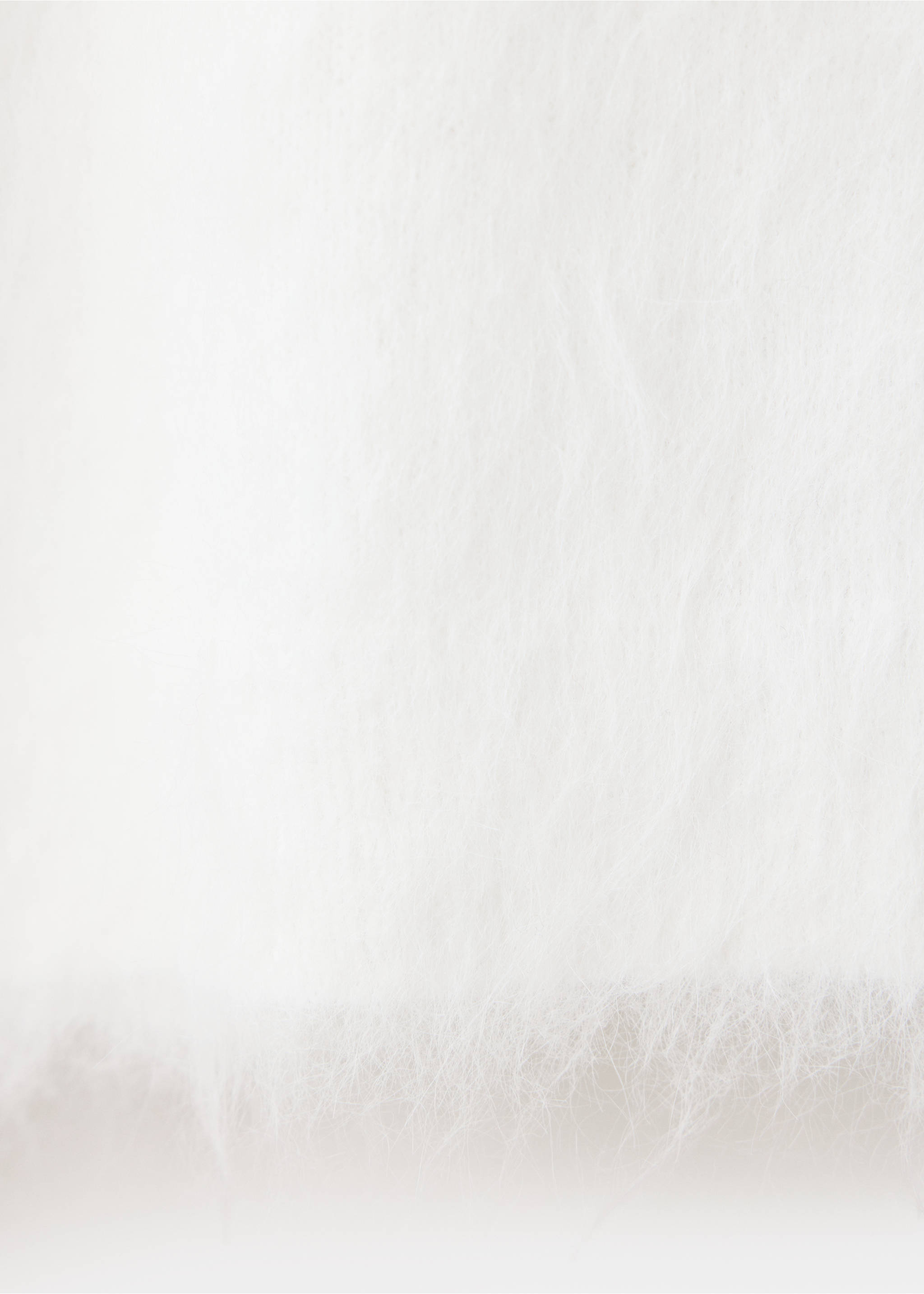 Close-up of the white fluffy knit fabric of a jersey., Off White. Ref: 37009132-00.