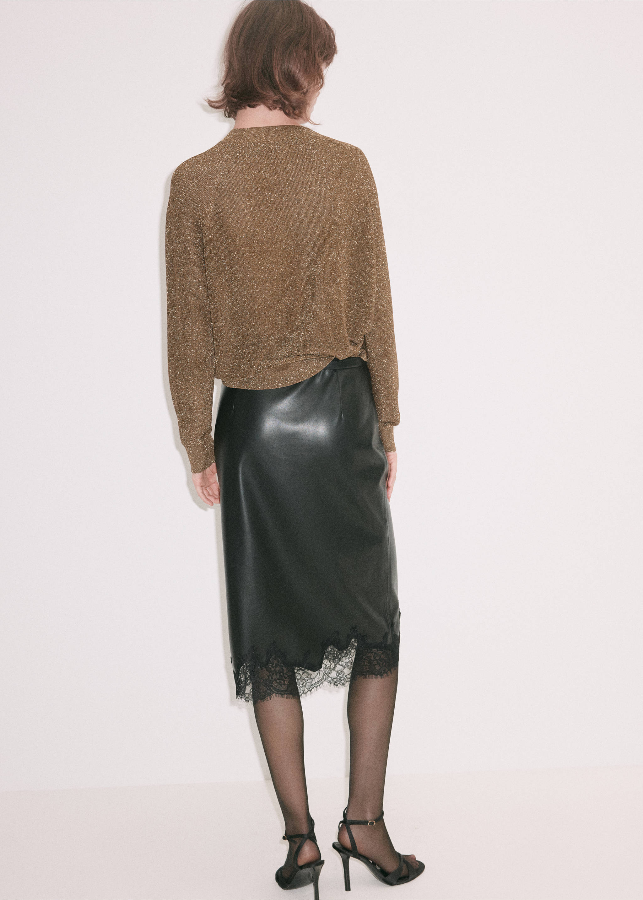 Back view of a metallic gold jersey with long sleeves., Gold. Ref: 37009140-00.