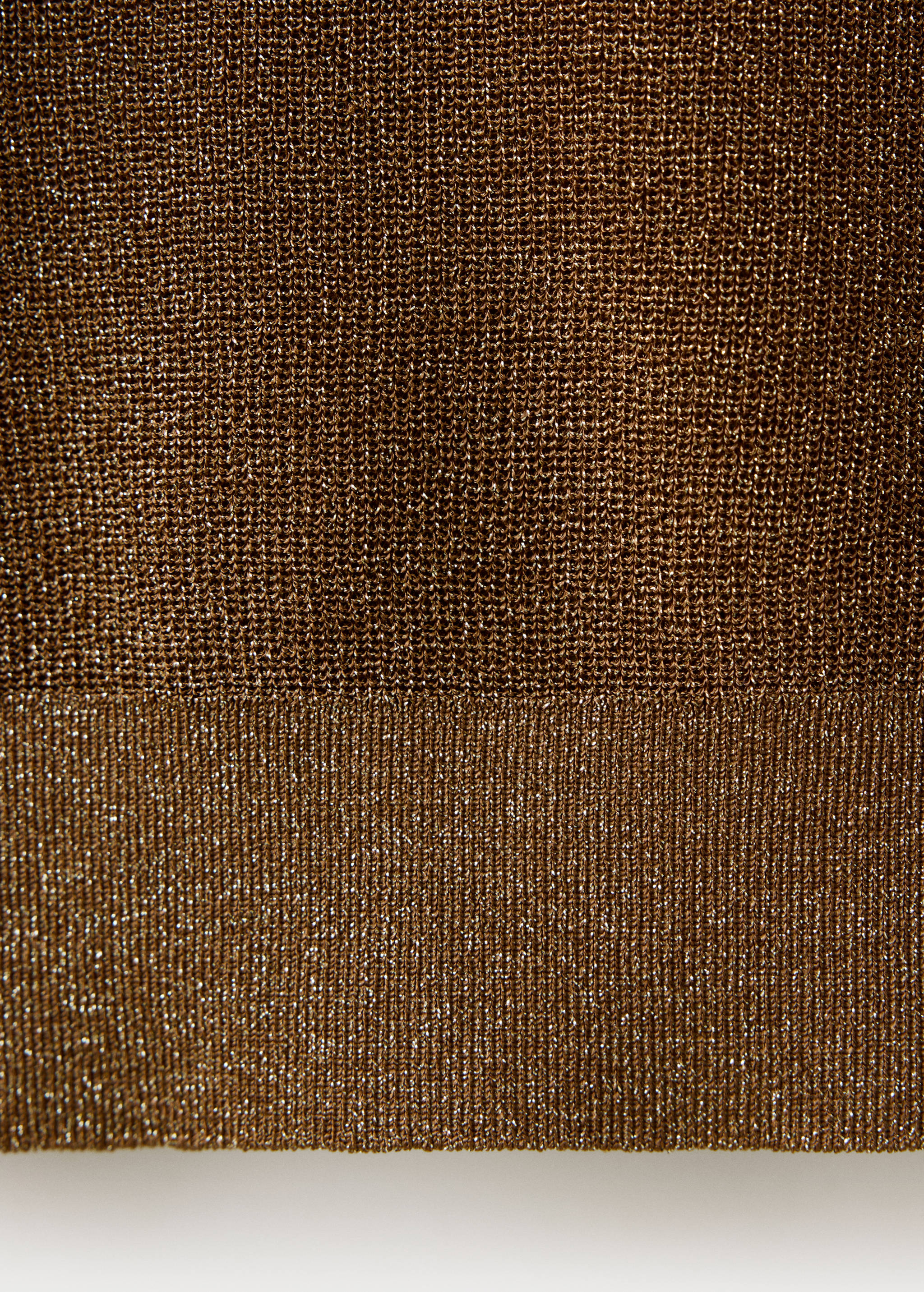 Bronze metallic knit jersey fabric texture detail