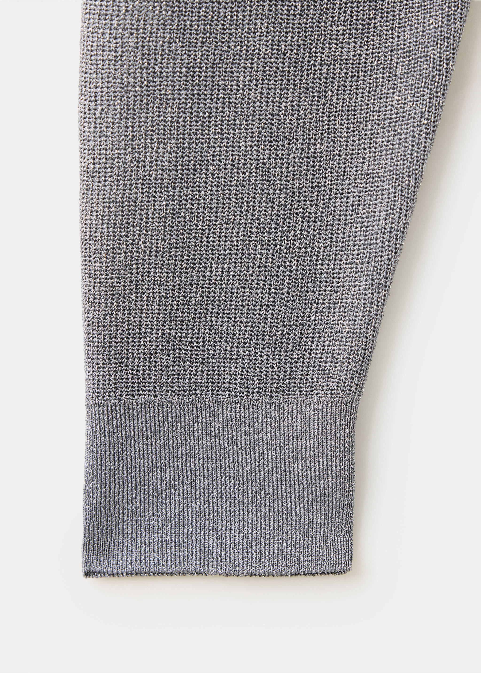 Close-up of a grey jersey showing the fine knit fabric and ribbed cuff., Silver. Ref: 37009140-00.