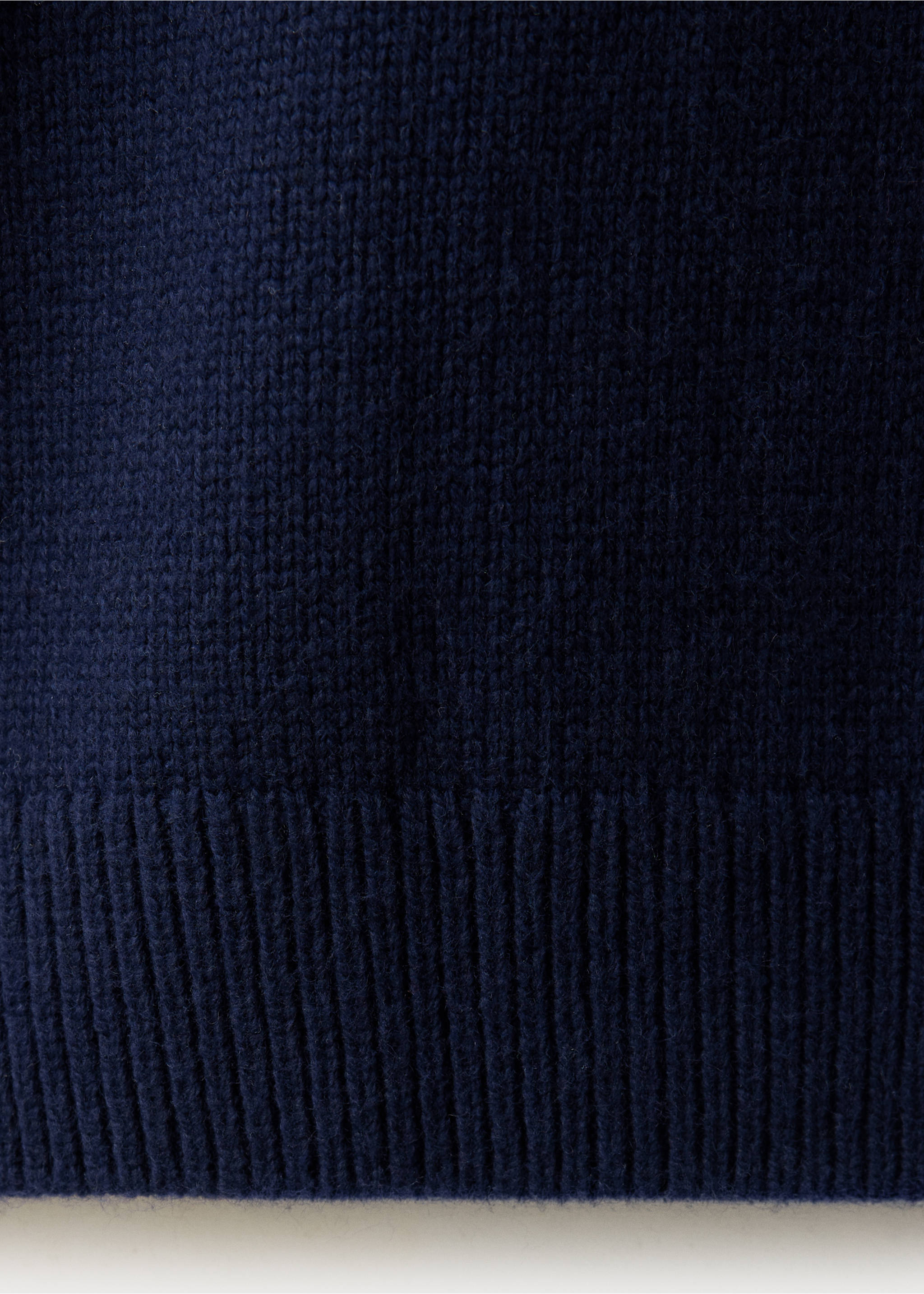 Dark navy blue jumper fabric texture detail showing a fine knit and ribbed hem., Navy. Ref: 37009152-00.