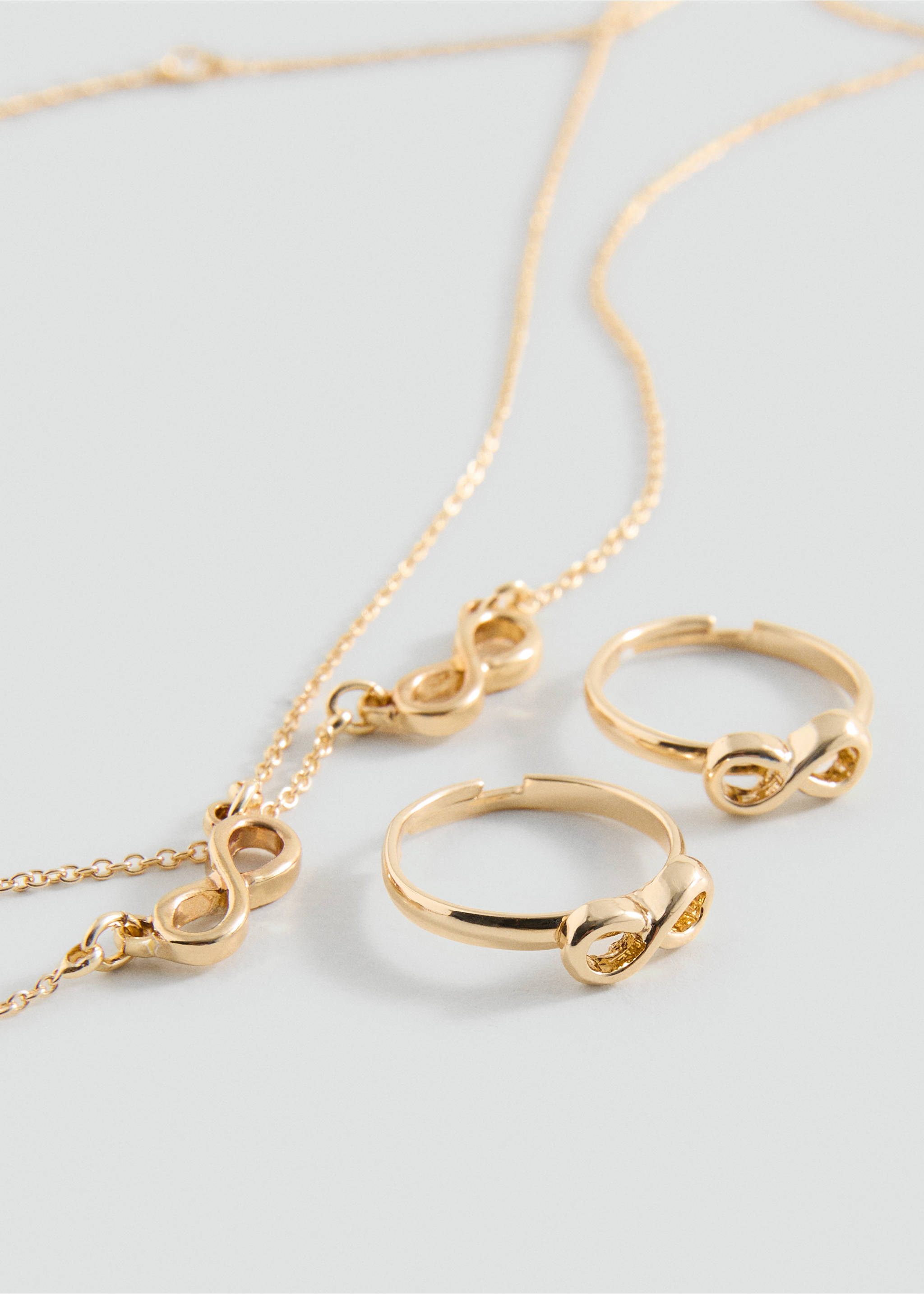 Infinity necklace and ring set - Medium plane, Gold. Ref: 37011358-00.