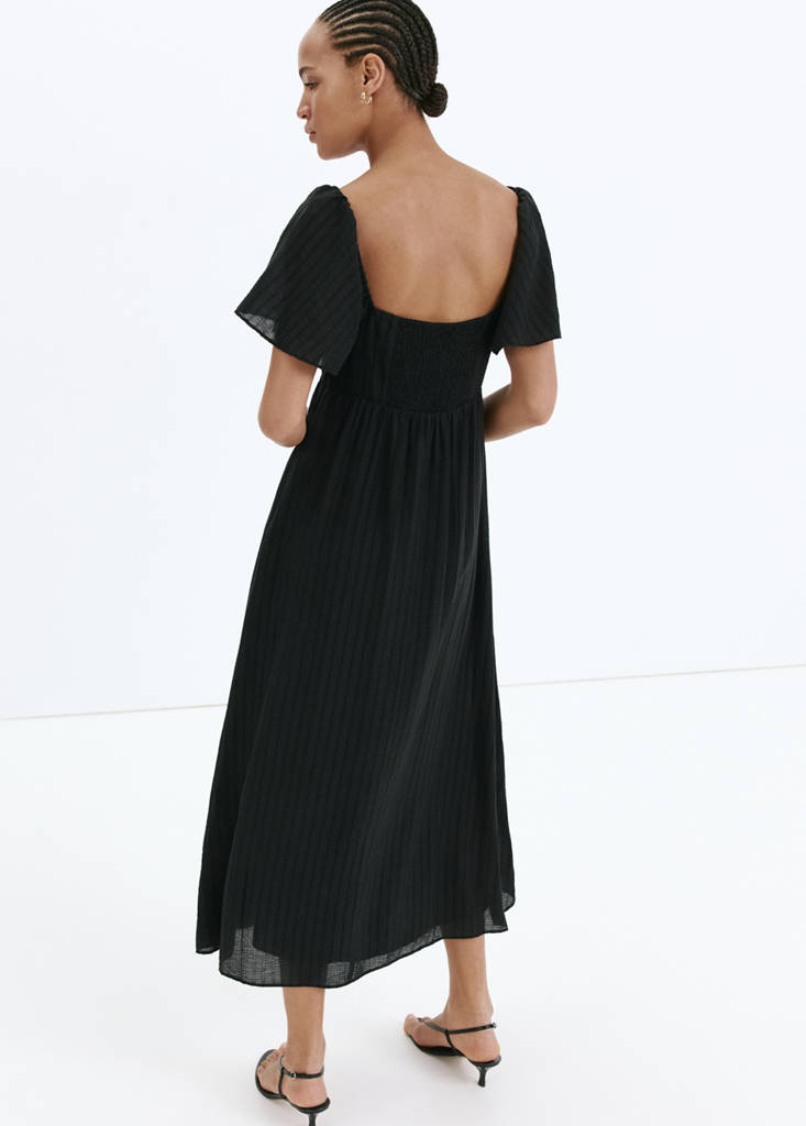 Textured dress with gathered detail — Black