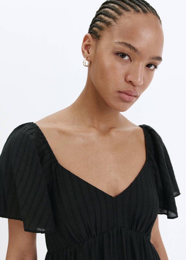Textured dress with gathered detail — Black