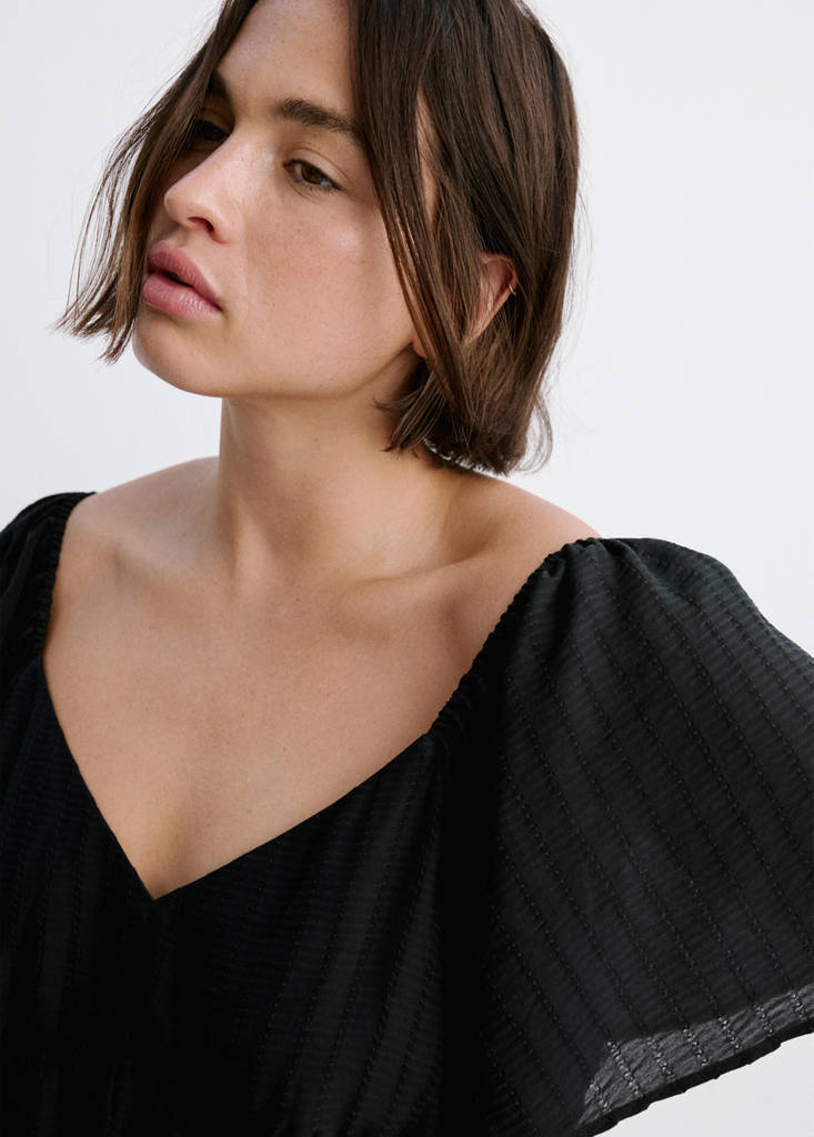 Textured dress with gathered detail — Black