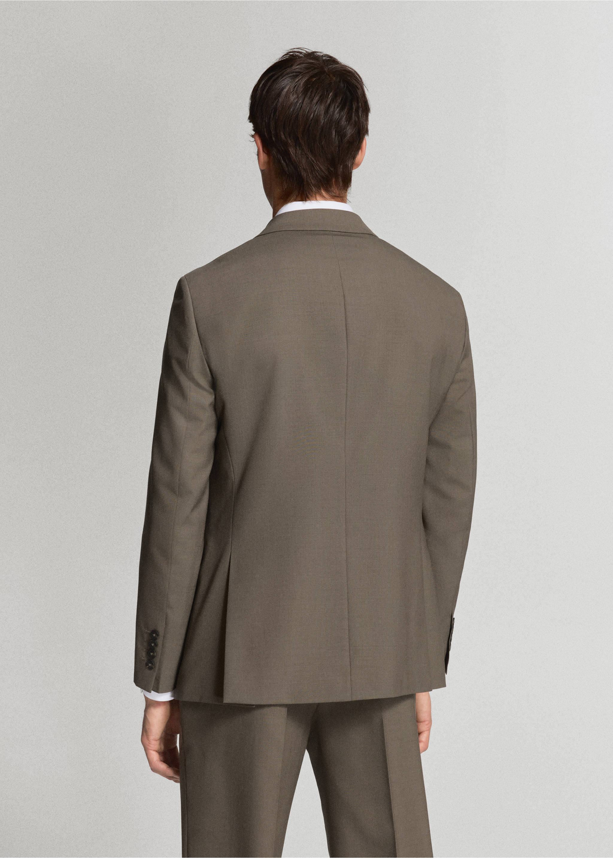 Olive green blazer viewed from the back, worn over a white shirt., Medium Brown. Ref: 37011420-01.