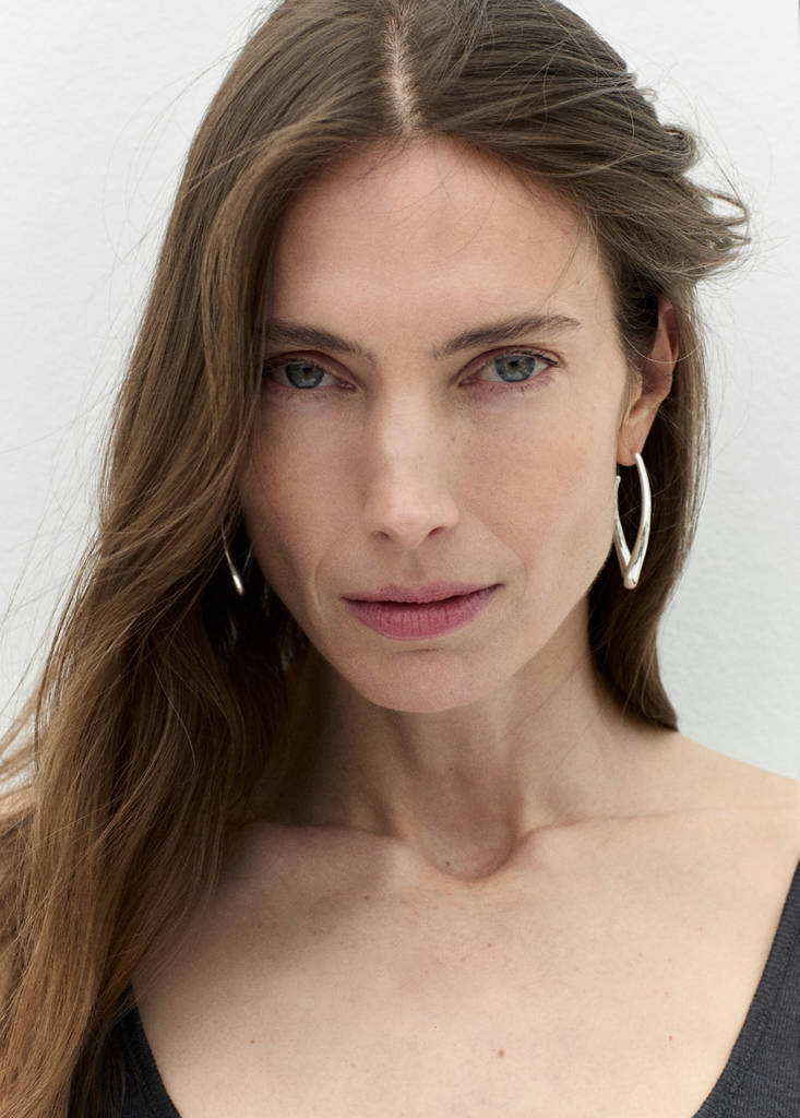 Twisted hoop earrings — Silver