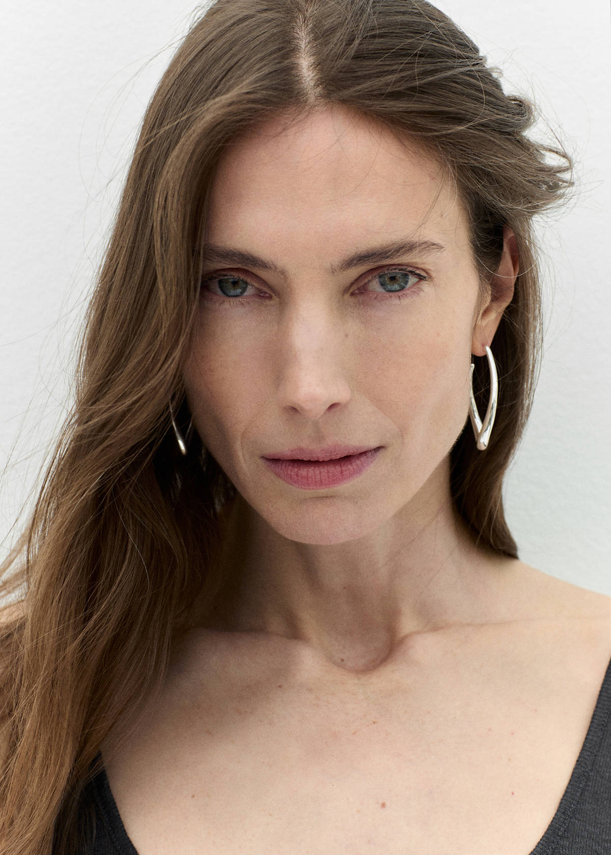 Twisted hoop earrings — Silver