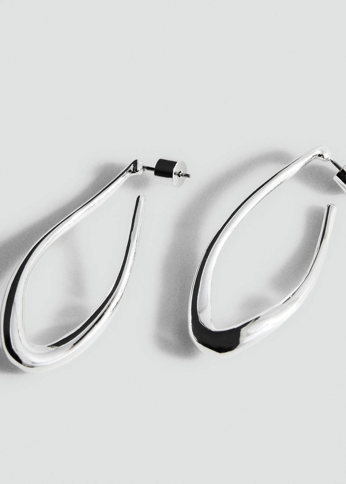Twisted hoop earrings — Silver
