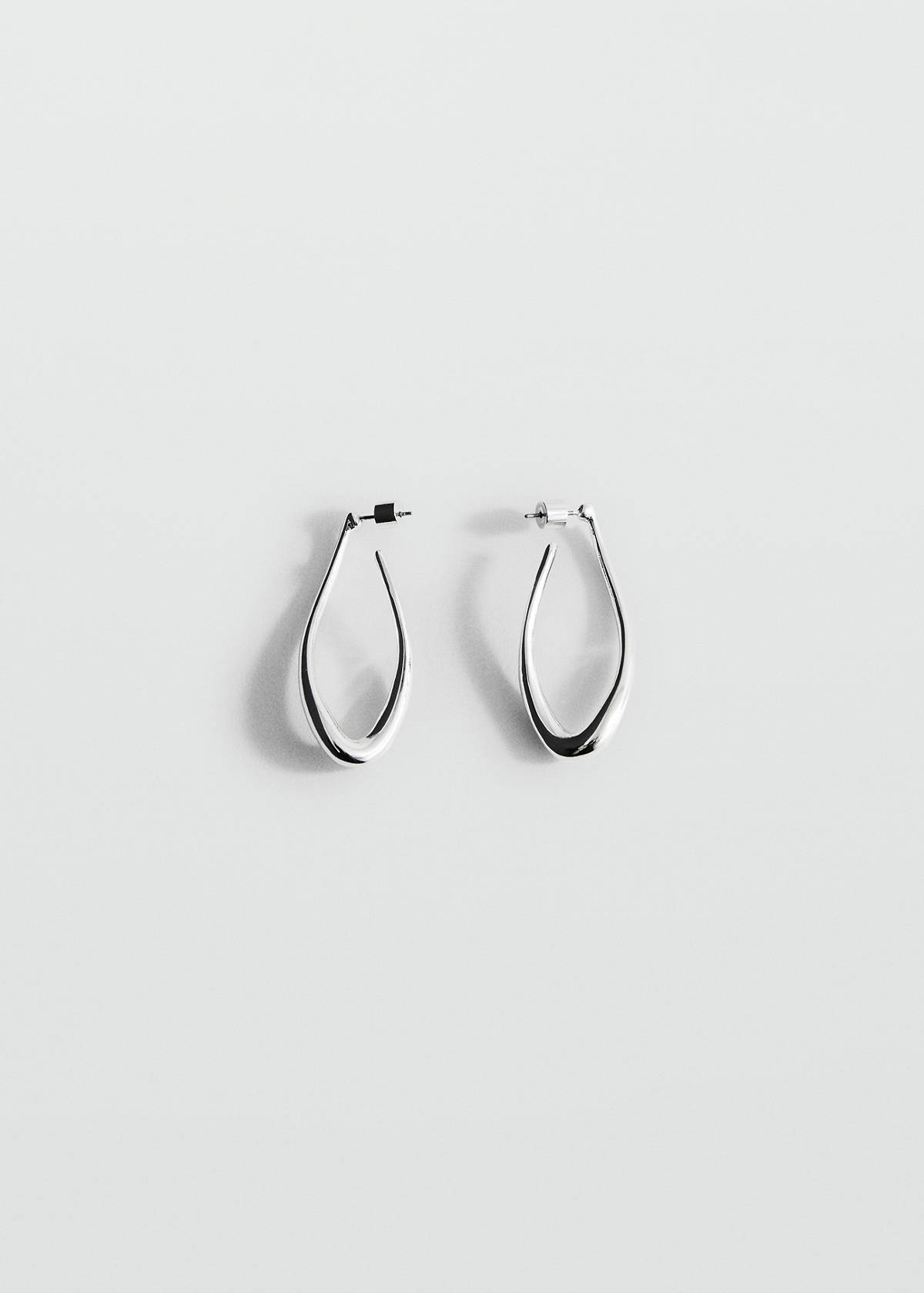 Twisted hoop earrings — Silver
