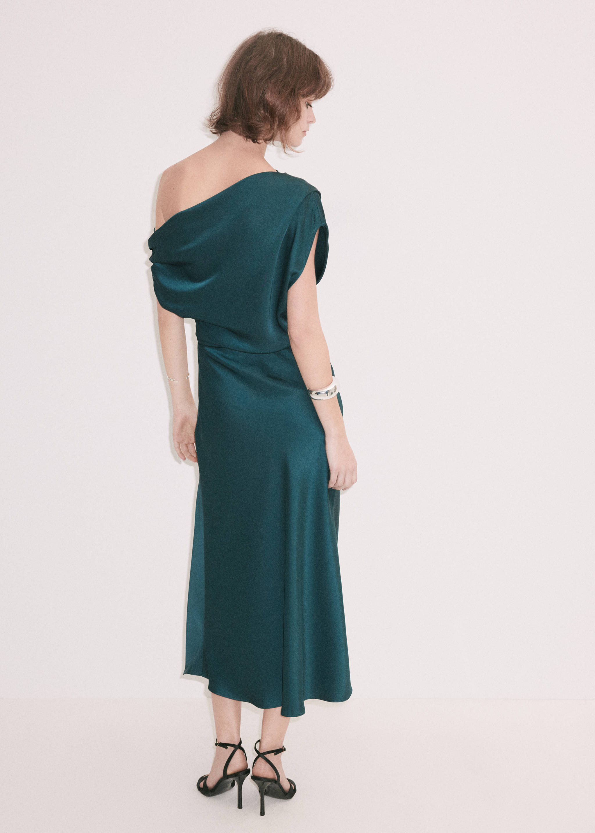 Dark green one-shoulder midi dress, back view.