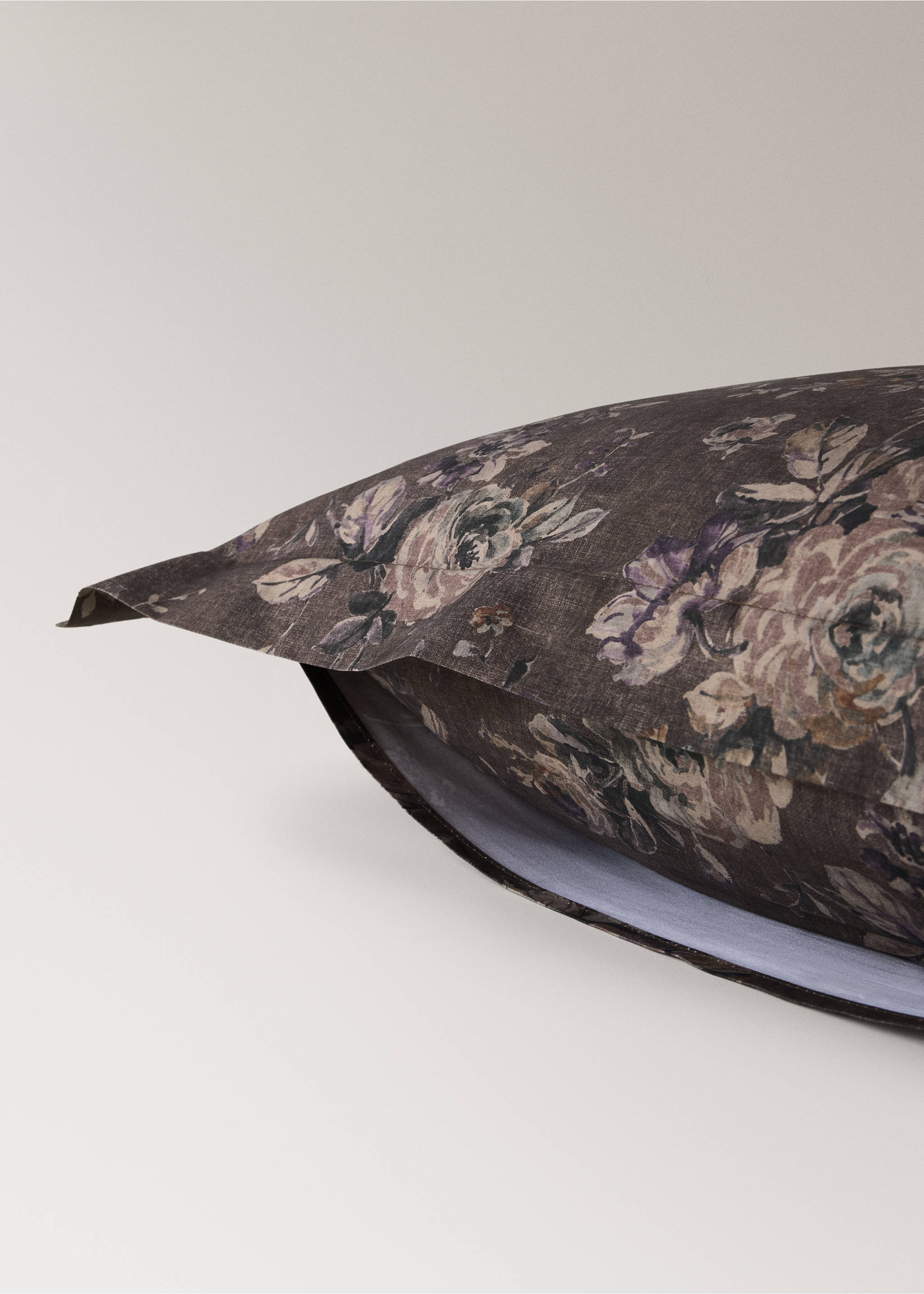 Close-up of a dark brown floral print pillowcase., Brown. Ref: 37014113-00.