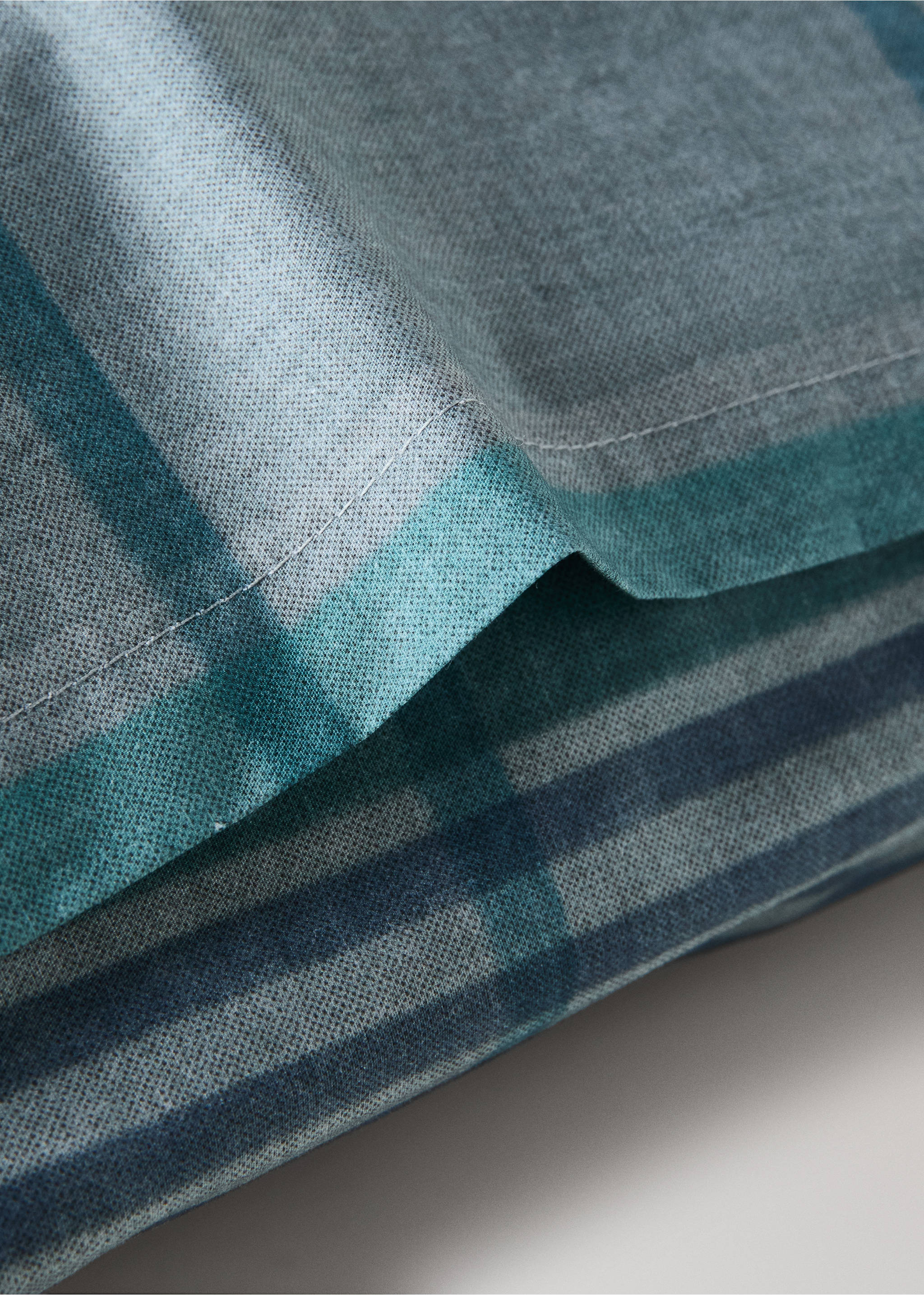 Two multicoloured check percale cotton pillowcases 50x75 cm - Details of the article 1, Forest Green. Ref: 37014115-00.