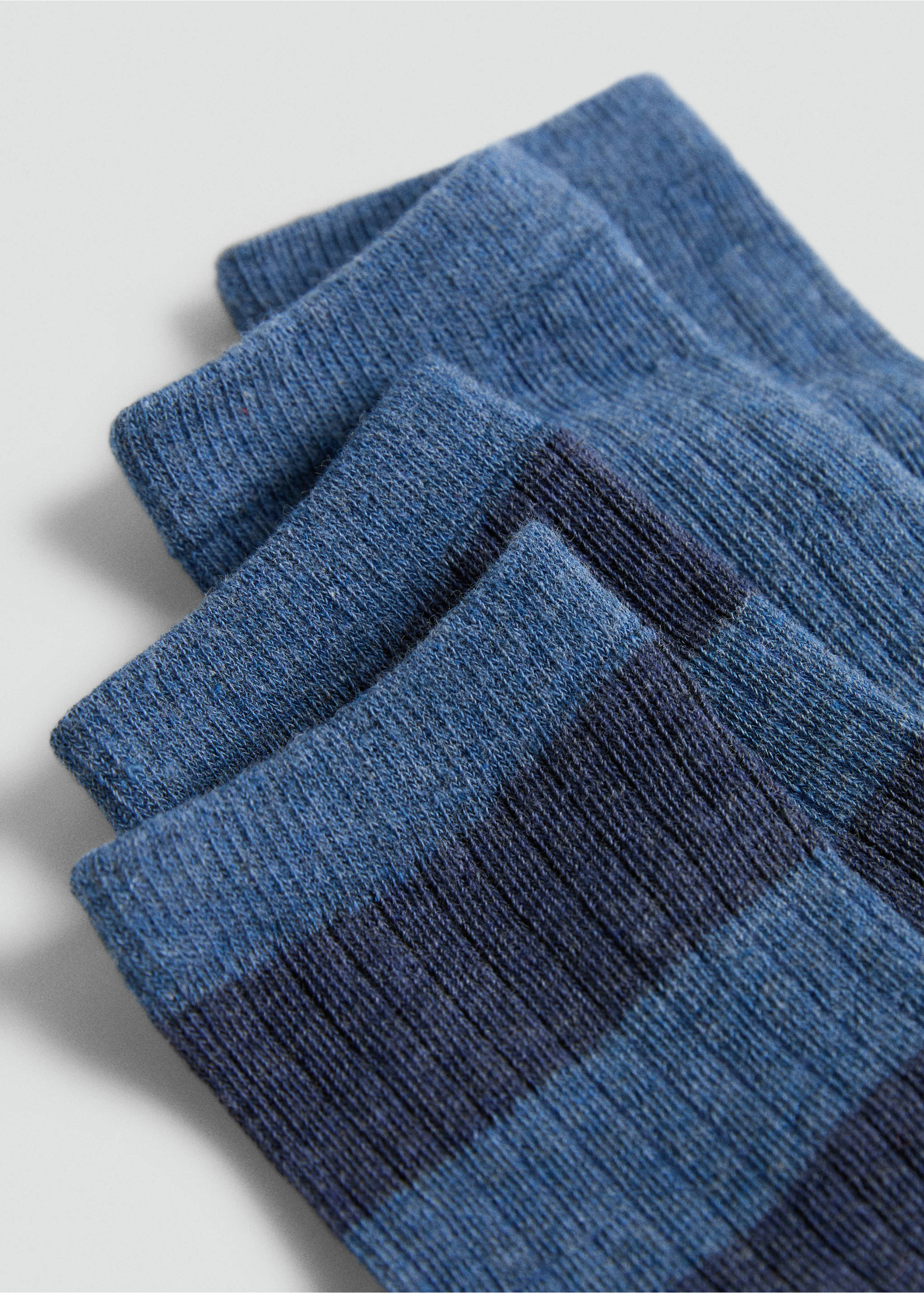 Blue striped socks in a close-up still life., Aqua Green. Ref: 37014792-00.