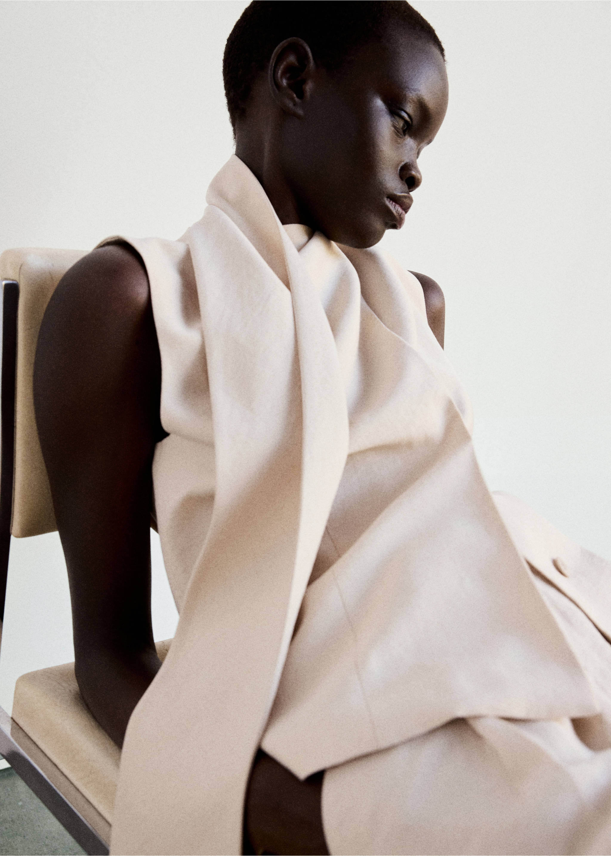 Beige sleeveless top with an integrated scarf neck detail., Light/Pastel Grey. Ref: 37014803-01.