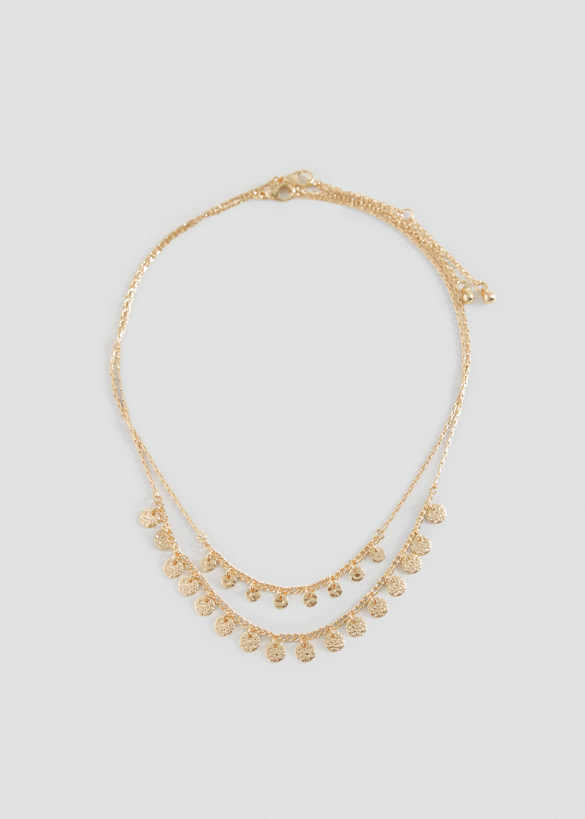 Double-strand gold-coloured chain necklace with textured coin pendants.