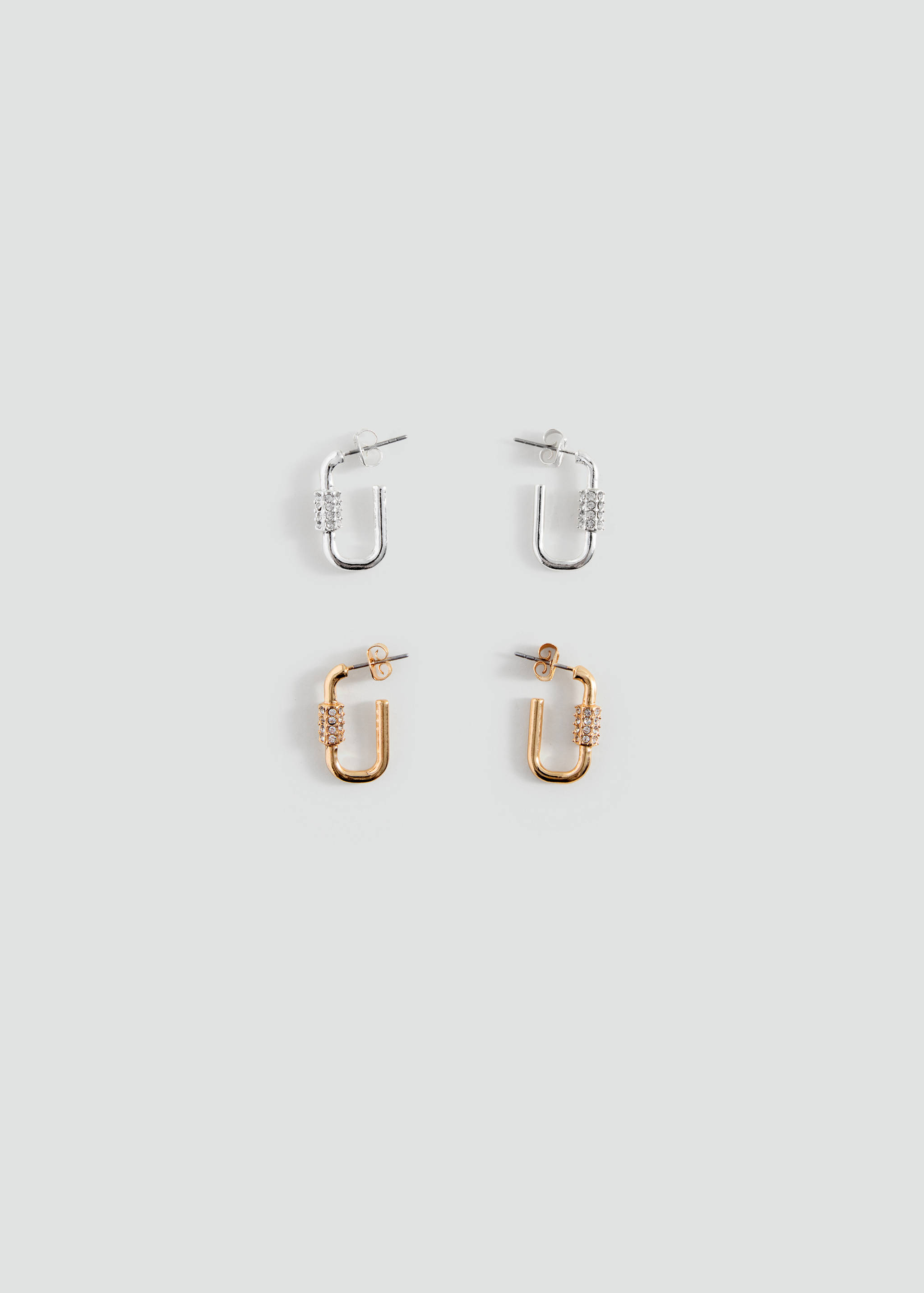 Set of four silver and gold carabiner hoop earrings with crystals.