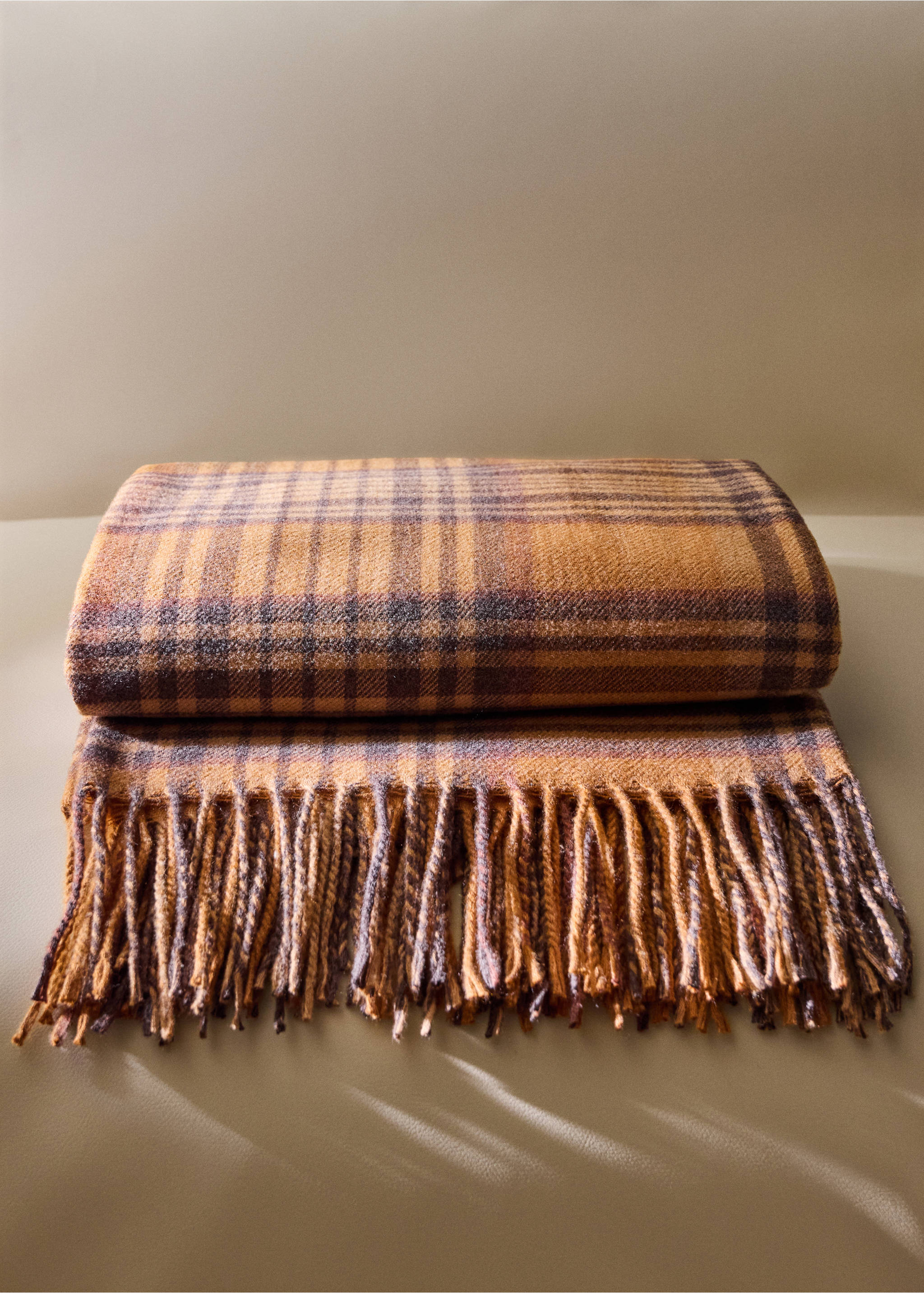 Soft throw with striped design and fringe detail - General plane, Ochre. Ref: 37015844-00.