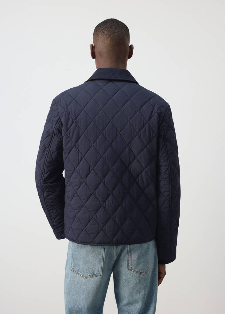 Quilted water repellent jacket — Night Blue