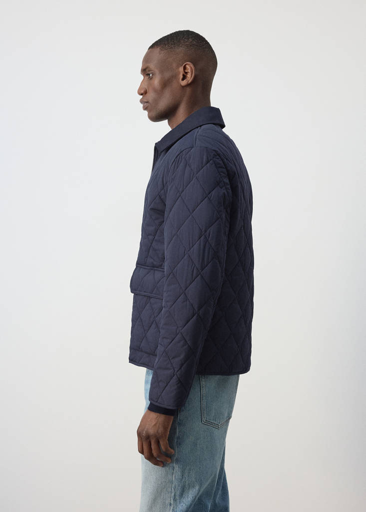 Quilted water repellent jacket — Night Blue