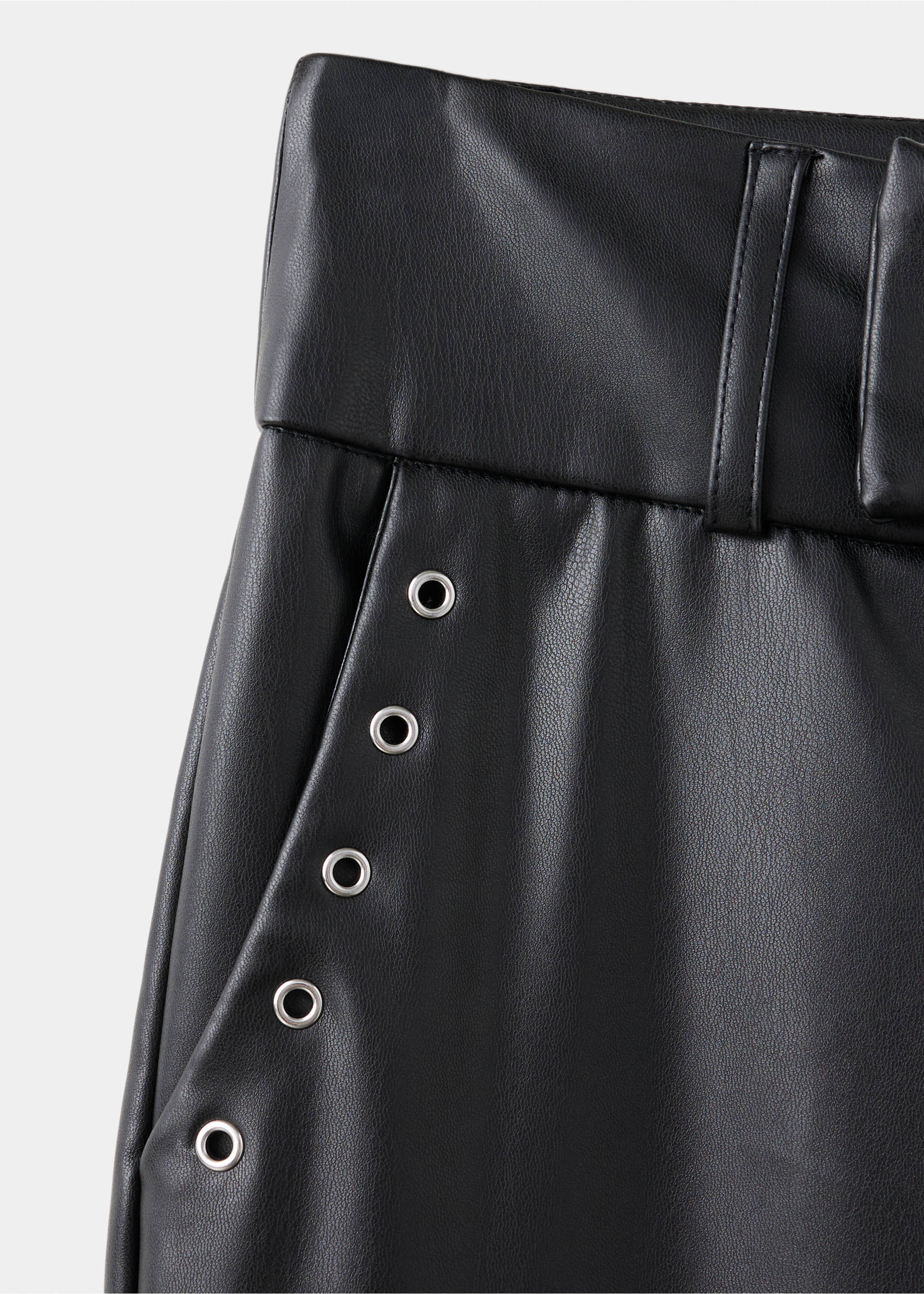 Leather-effect trousers with eyelets - Details of the article 0, Black. Ref: 37016344-00.