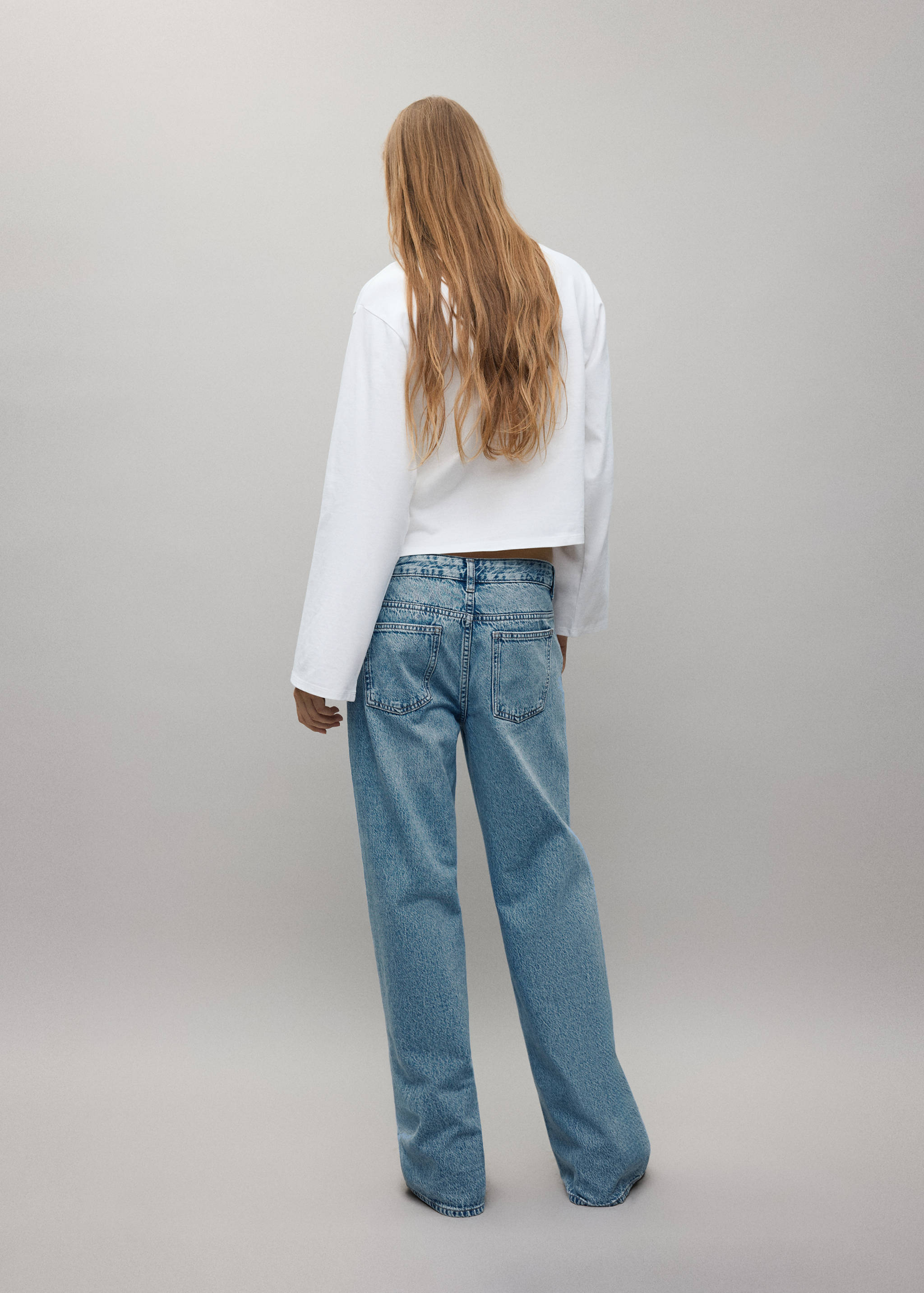 Wide-leg jeans with crossover closure - Reverse of the article