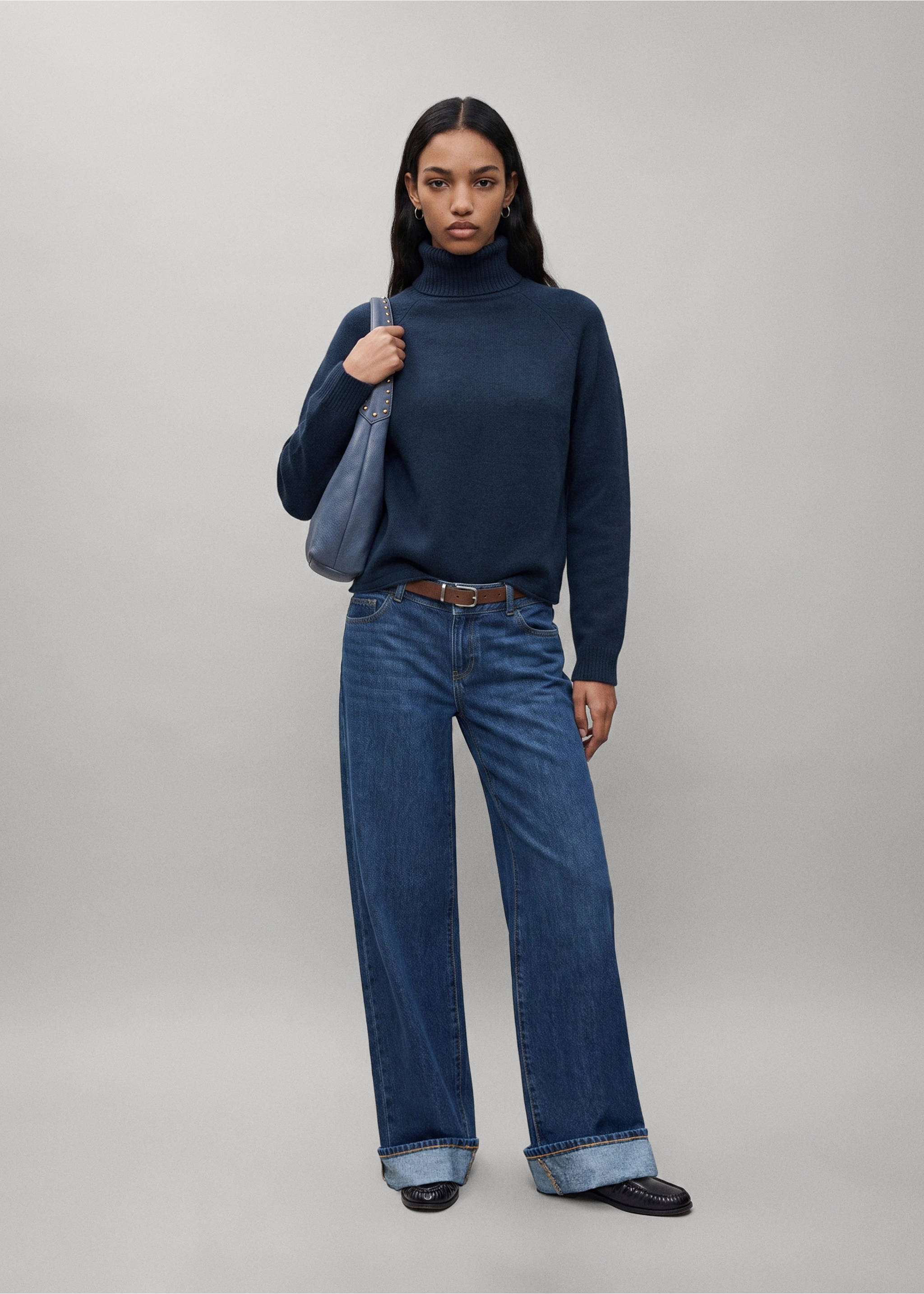 Navy blue turtleneck jersey with long sleeves and ribbed trims, worn with wide-leg jeans., Navy. Ref: 37017139-00.
