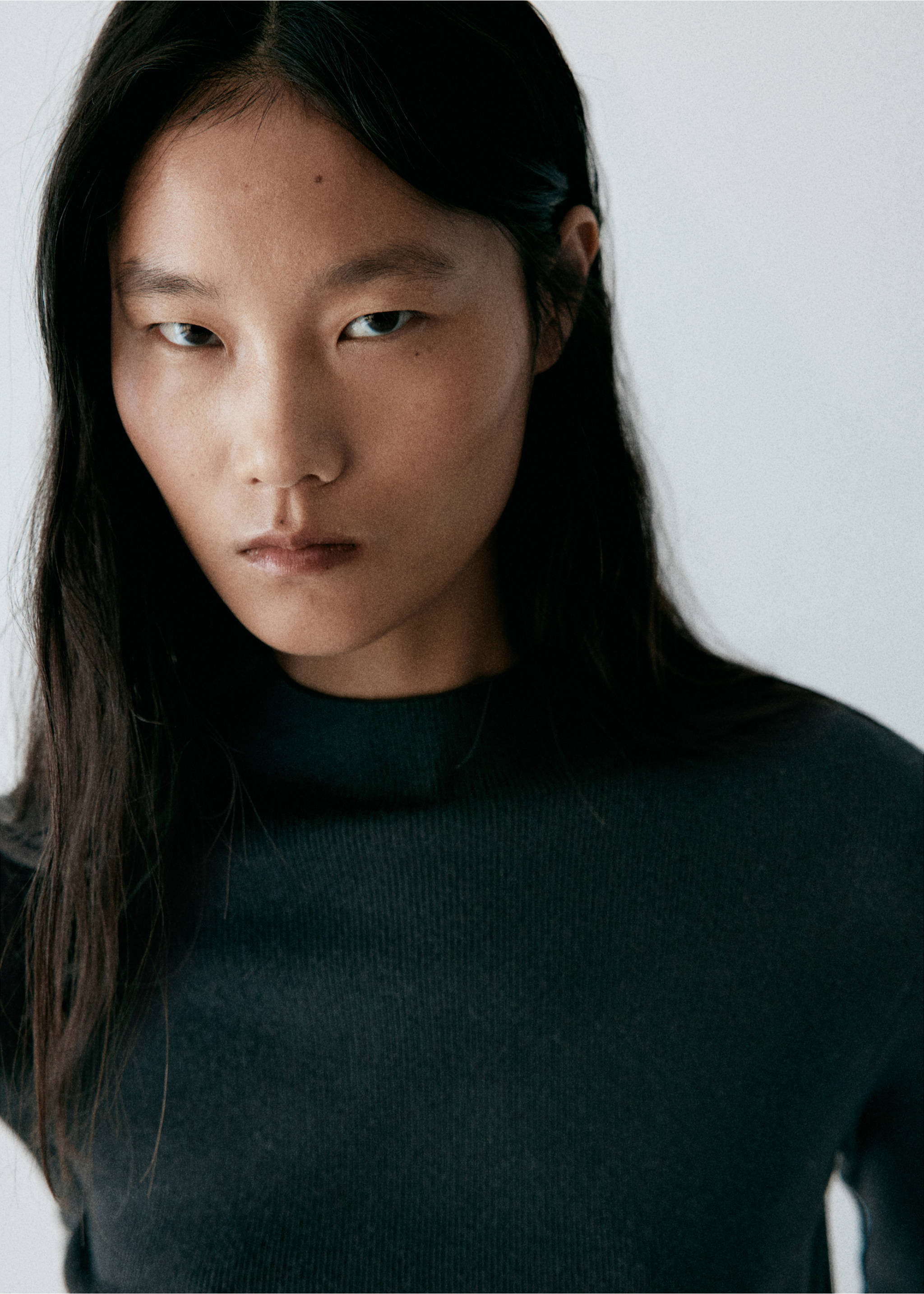Knitted sweater with perkins neck - Details of the article 1, Black. Ref: 37017778-00.